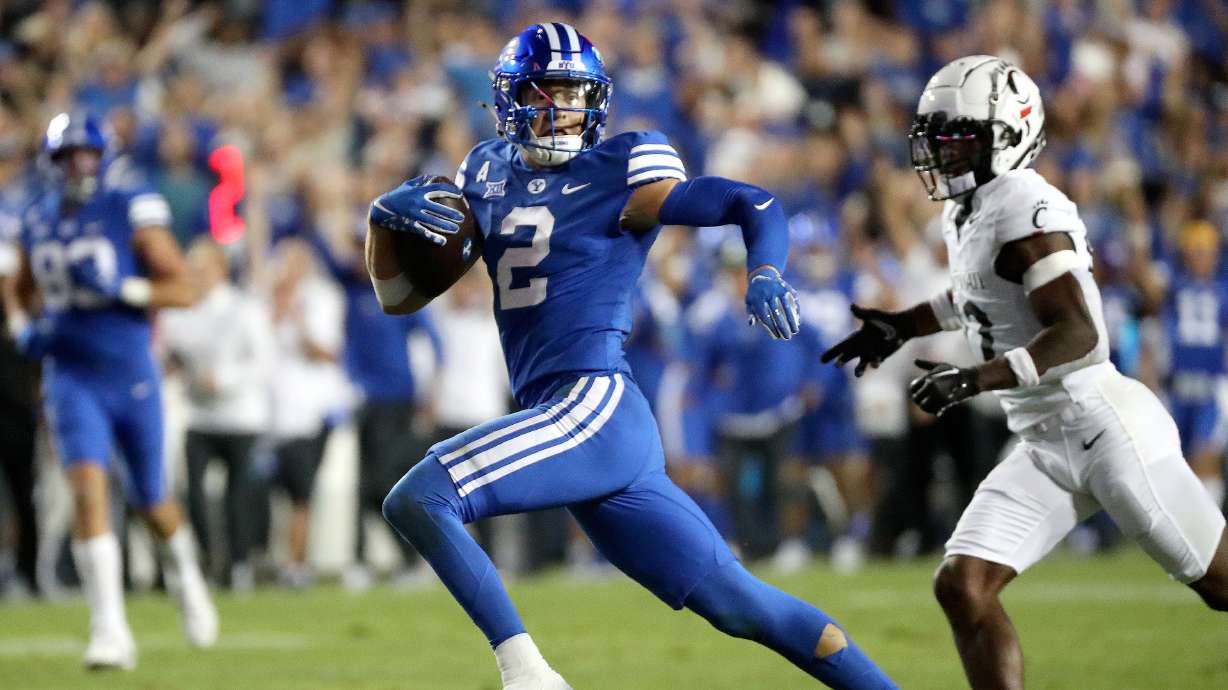 Brigham Young Cougars wide receiver Chase Roberts runs for a touchdown during the second half of a football game against the Cincinnati Bearcats at LaVell Edwards Stadium in Provo on Friday, Sept. 29, 2023. BYU won 35-27.