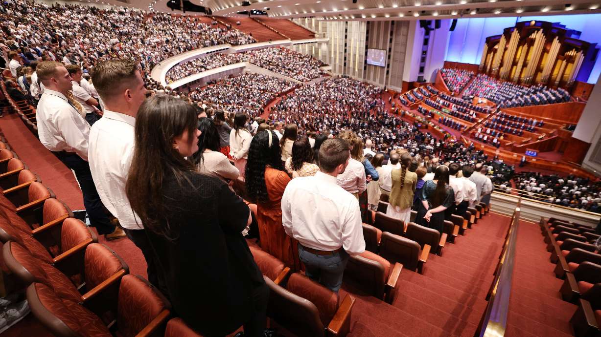 Attendees sing during the193rd Semiannual General Conference of The Church of Jesus Christ of Latter-day Saints at the conference center in Salt Lake City on Saturday.