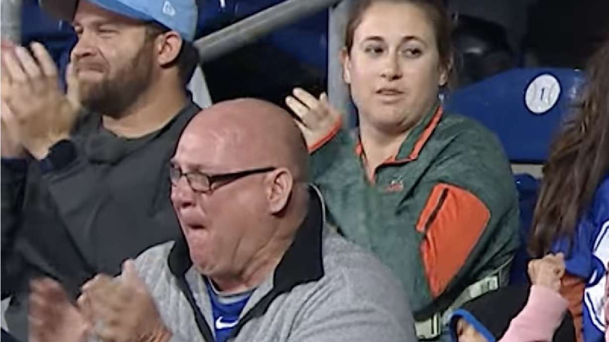 Todd Kerering, center, watched his son make his Major League Baseball debut as a relief pitcher for the Phillies on Sunday.