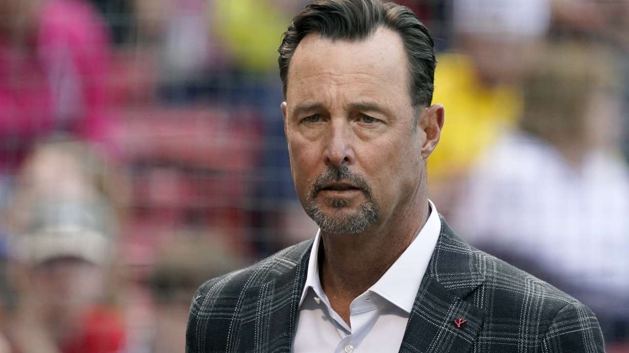 FILE - Former Boston Red Sox player Tim Wakefield looks on before the start of a baseball game between the Red Sox and Oakland Athletics at Fenway Park, Wednesday, June 15, 2022, in Boston. The Boston Red Sox say announcer and former knuckleballer Tim Wakefield is undergoing treatment for a disease they did not specify and asked for fans to respect his privacy after his illness was outed without his consent by ex-teammate Curt Schilling. The team issued a statement on Thursday, Sept. 28, 2023, after Schilling said on a podcast that Wakefield had brain cancer. The news led to an outpouring of support for Wakefield – and criticism of Schilling. Wakefield is 57.