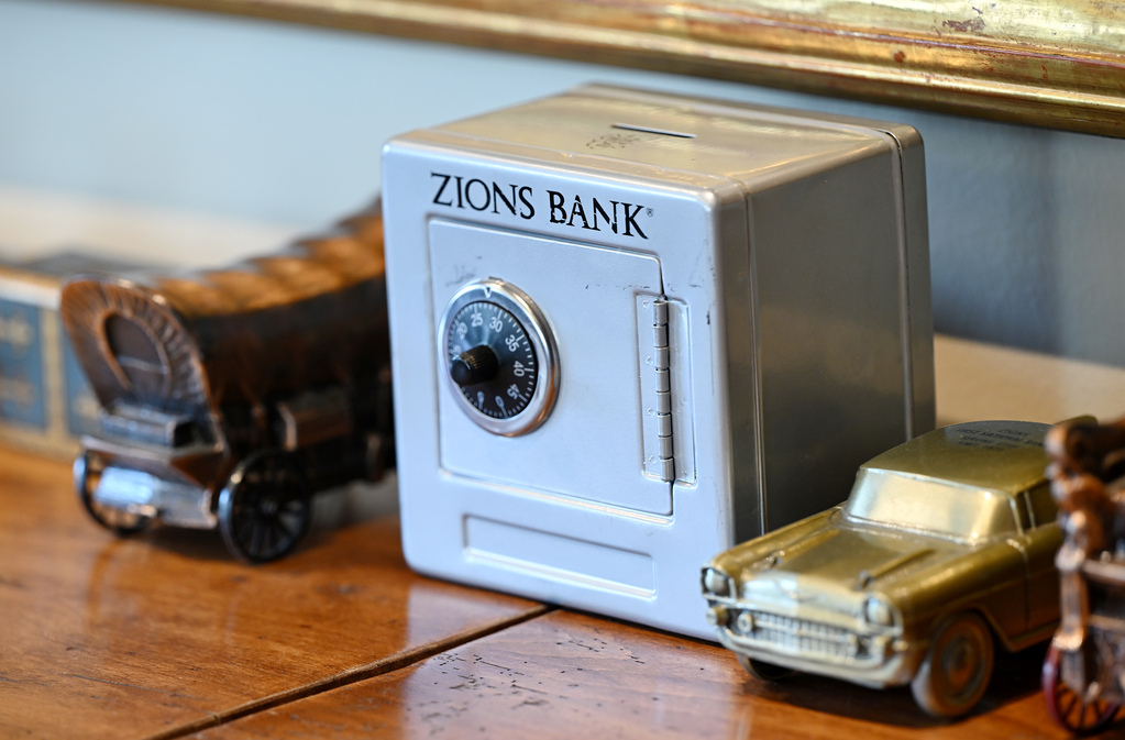 Small banks on display in the office of Zions Bank President and CEO Scott Anderson in Salt Lake City on Sept. 20.