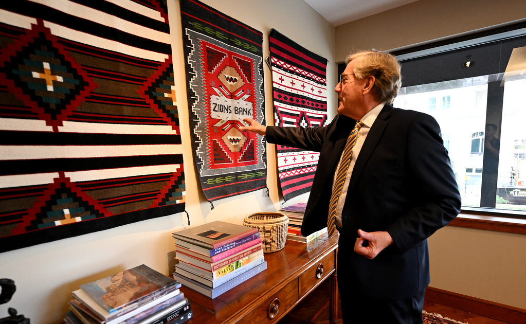 Zions Bank President and CEO Scott Anderson shows a gift that he received from members of the Navajo Nation that he has on display in his office in Salt Lake City on Sept. 20.