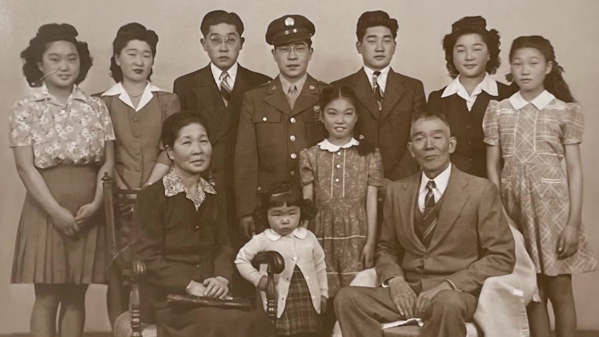 A family photo shows Margee-kito Okimura with her family during WWII, as seen in this undated photo.
