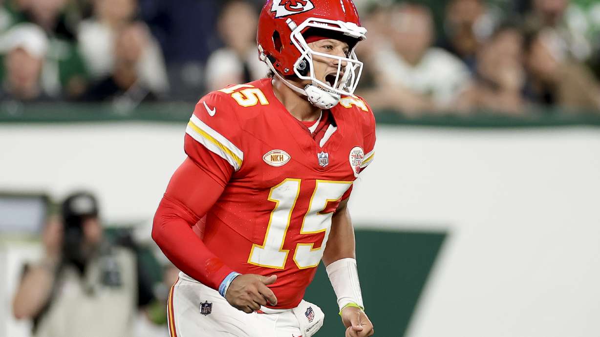 Kansas City Chiefs quarterback Patrick Mahomes (15) reacts after a touchdown against the New York Jets during the first quarter of an NFL football game, Sunday, Oct. 1, 2023, in East Rutherford, N.J.
