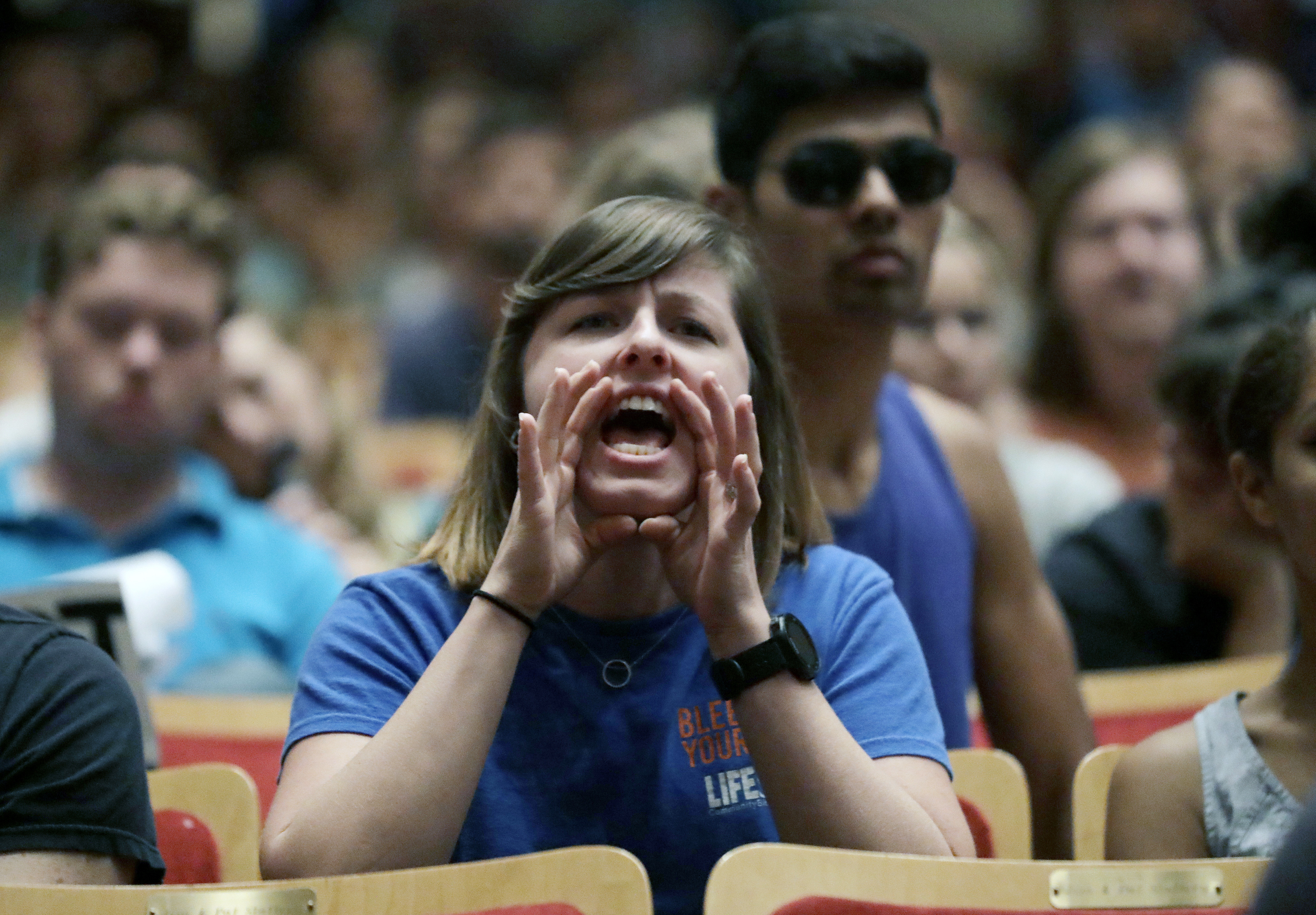 A protester shouts down White Nationalist Richard Spencer during a speech at the University of Florida in Gainesville, Fla., Oct. 19, 2017. New polling finds that America’s college campuses are seen as far friendlier to liberals than to conservatives when it comes free speech.