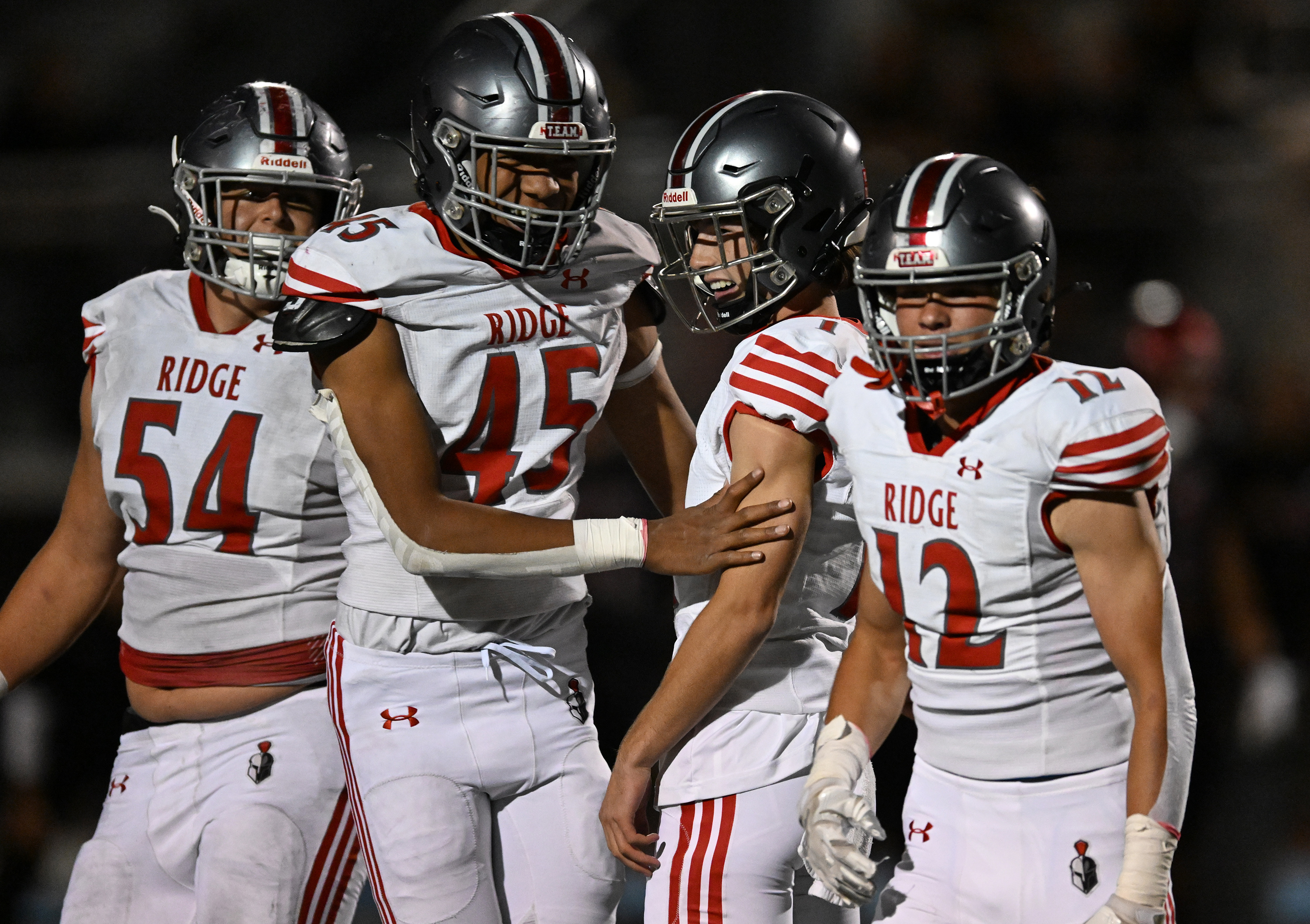 Mountain Ridge kicker Brody Laga celebrates with teammates after Laga hit another field goal as they and Herriman play at Herriman on Friday, Sept. 29, 2023.