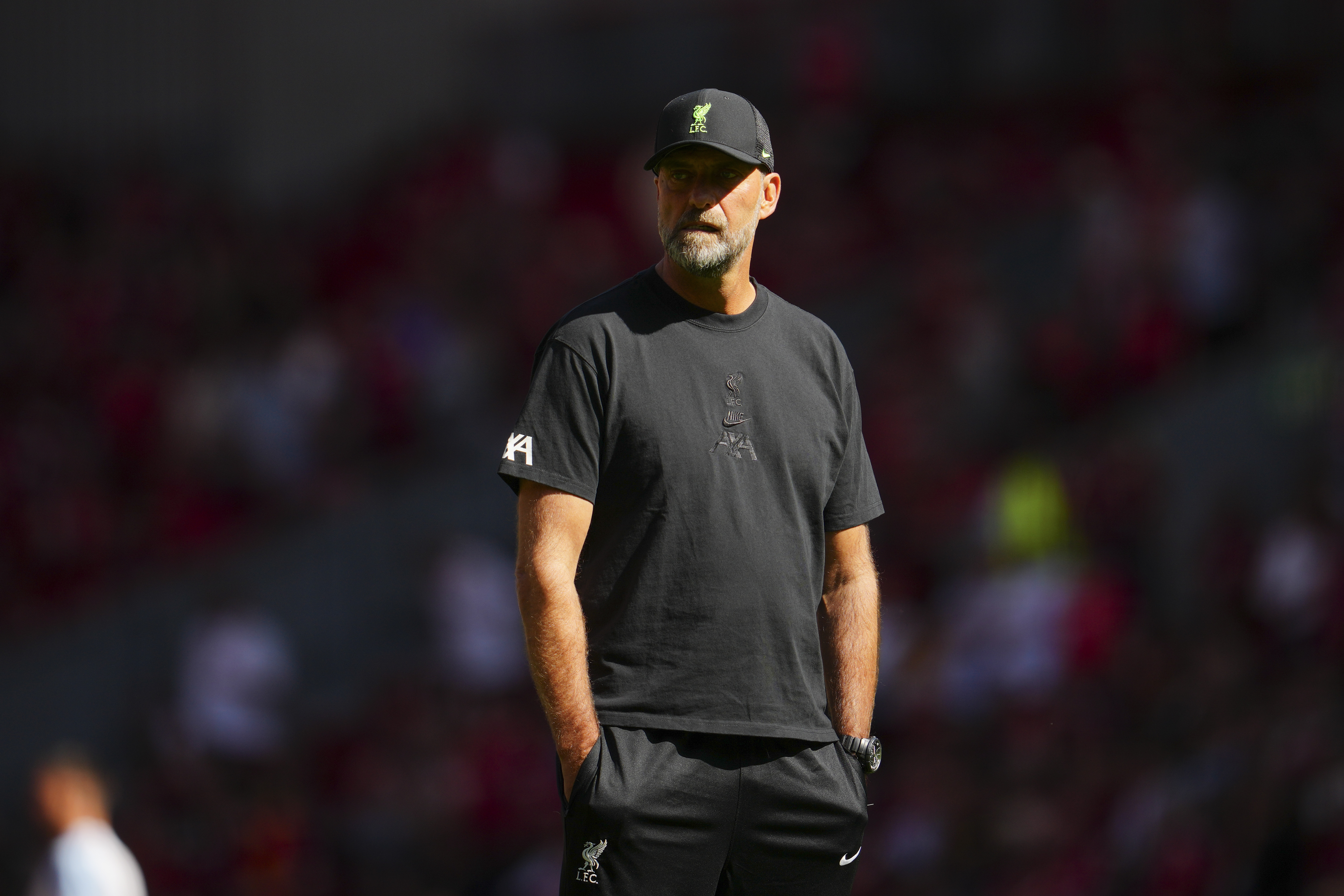 Liverpool's manager Jurgen Klopp watches his players warm up before the English Premier League soccer match between Liverpool and Aston Villa at Anfield stadium in Liverpool, Sunday, Sept 3, 2023.