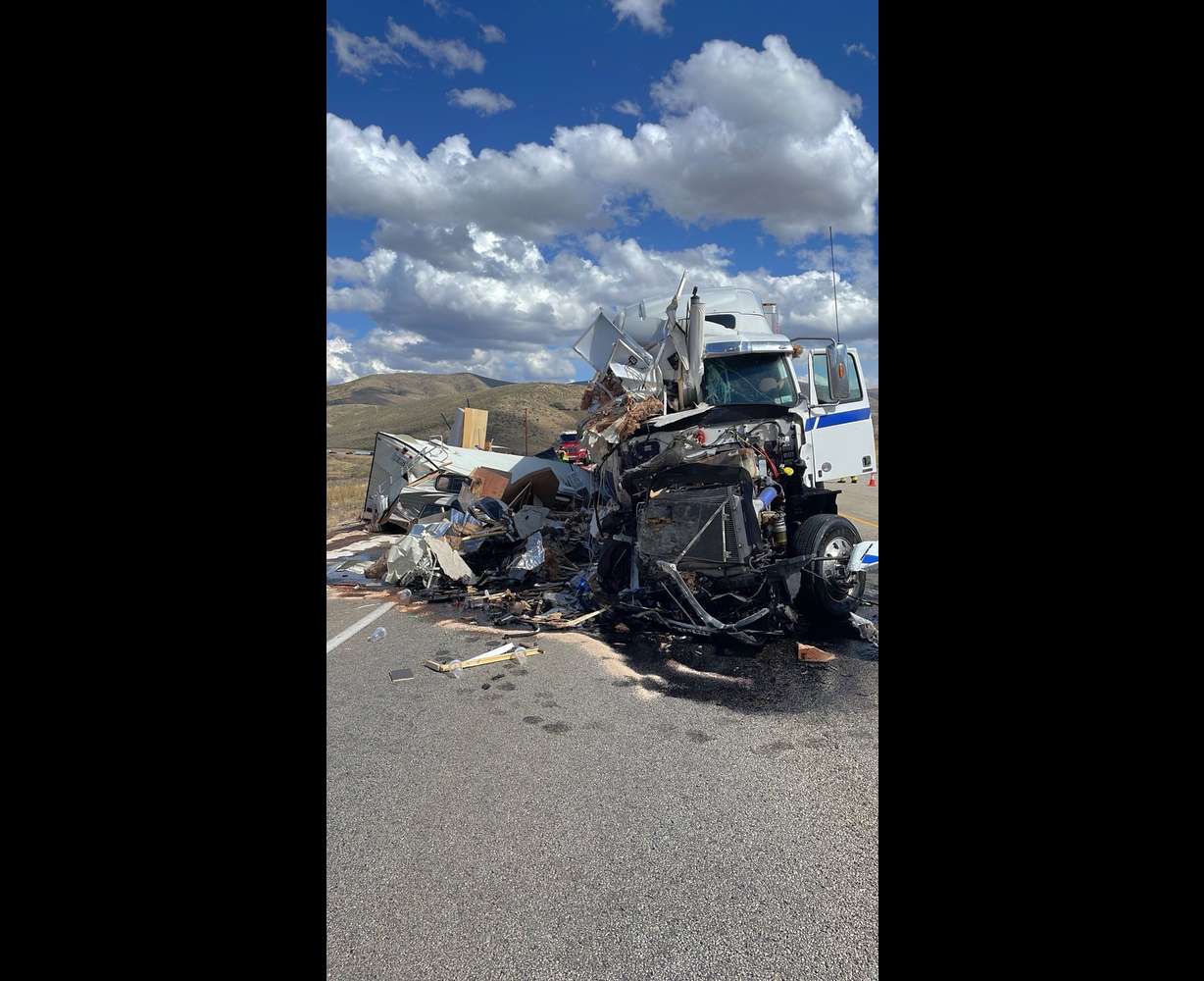 One man driving a pickup truck hauling a camper trailer died in a collision with a semitruck on U.S. 189 near Deer Creek State Park on Sunday.