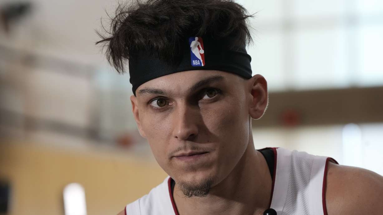Miami Heat guard Tyler Herro (14) listens during an interview as part of the NBA basketball team's media day, in Miami, Monday, Oct. 2, 2023.