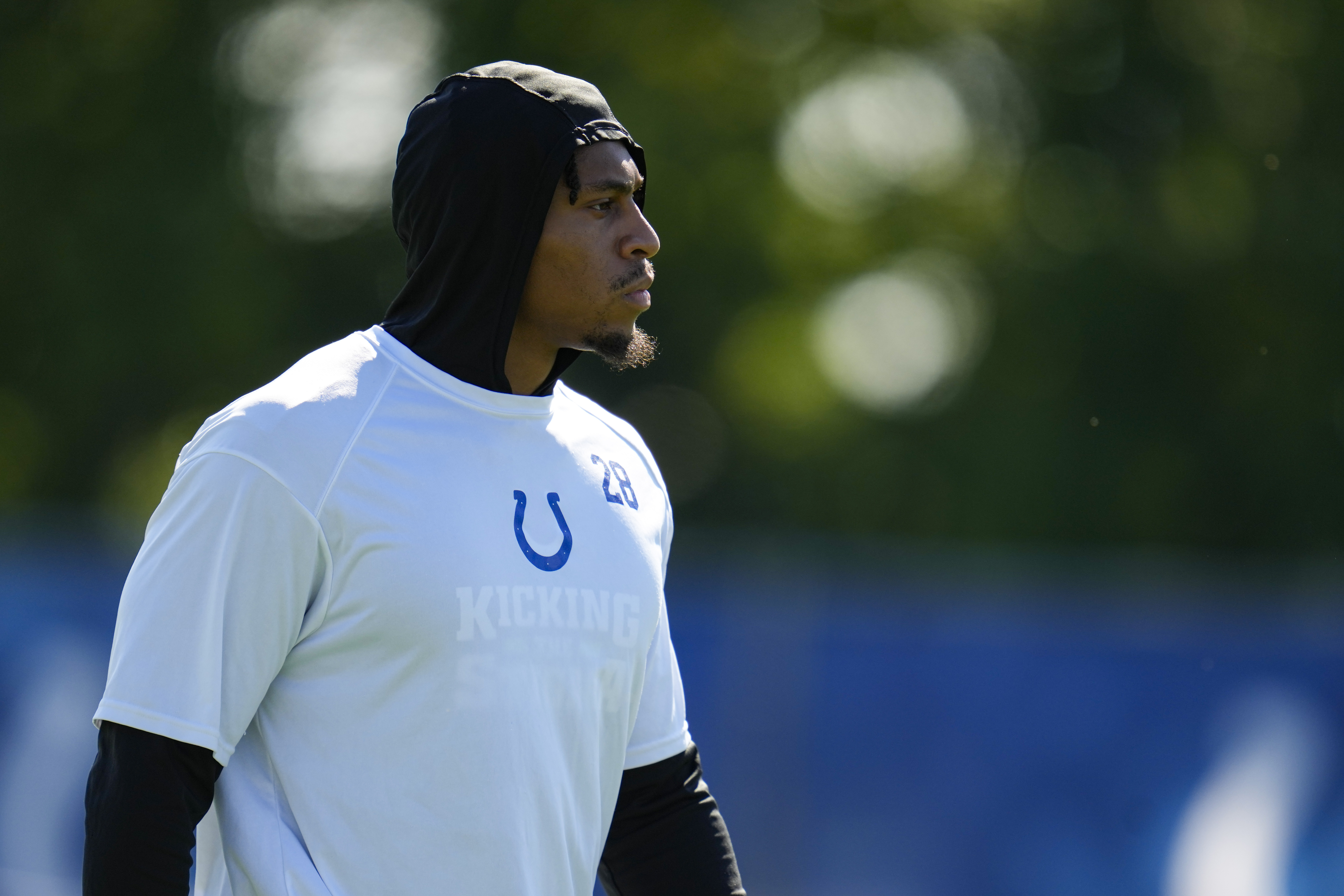 FILE - Indianapolis Colts running back Jonathan Taylor watches drills during practice at the NFL team's football training camp in Westfield, Ind., July 31, 2023. The Colts will activate the All-Pro running back this week and he could play Sunday, Oct. 8, against Tennessee.