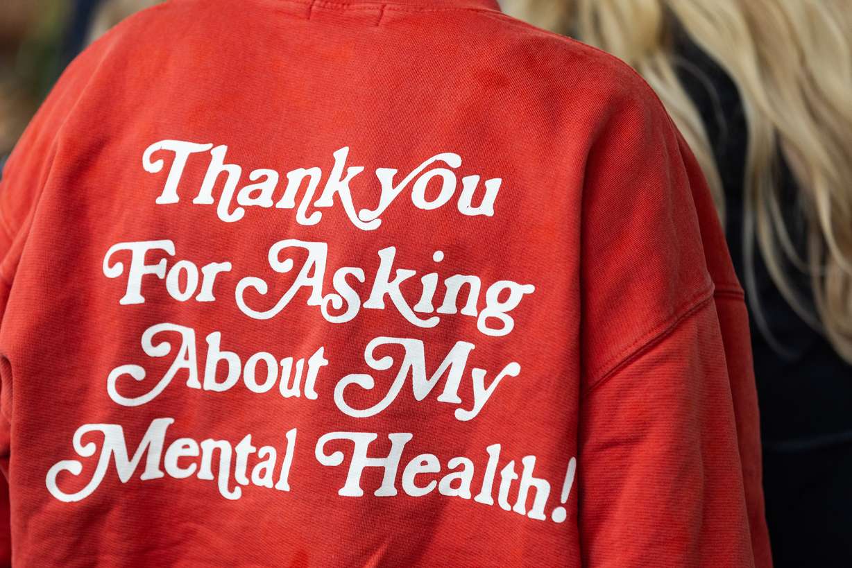 The back of a sweatshirt reading “Thank you for asking about my mental health!” at the groundbreaking ceremony for the Utah Mental Health Translational Research Building outside the Huntsman Mental Health Institute in Salt Lake City on Monday.