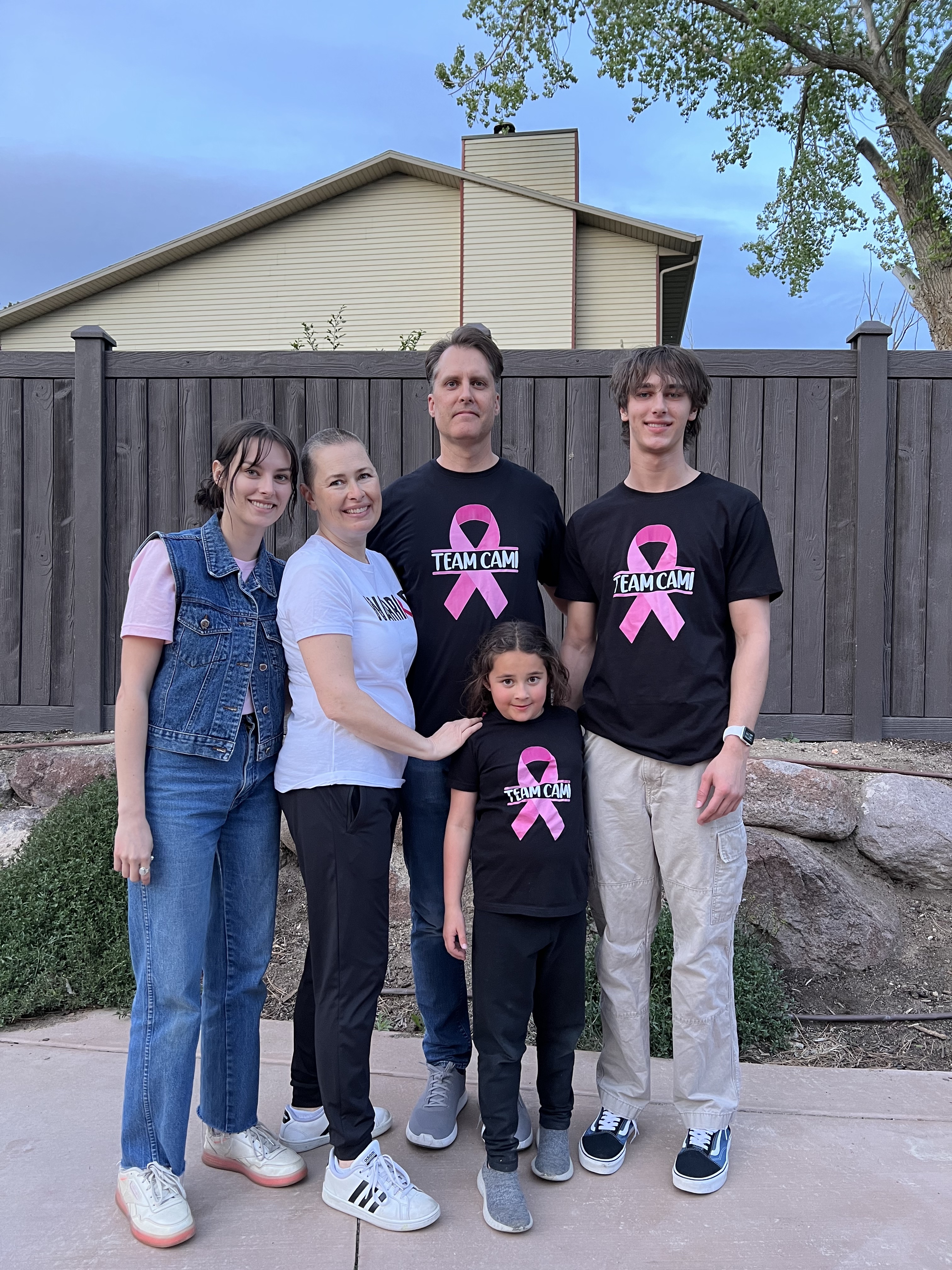 Breast cancer survivor Cami Kapp is pictured with her family in May 2022. Kapp has created the Pink Sync event for breast cancer survivors to heal, find community and be connected to expert resources.