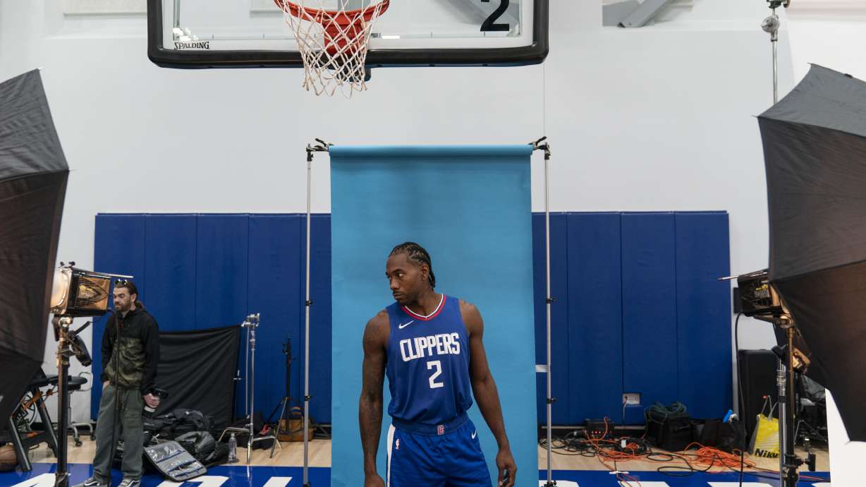 Los Angeles Clippers forward Kawhi Leonard poses for photos during the NBA basketball team's media day, Monday, Oct. 2, 2023, in Los Angeles.