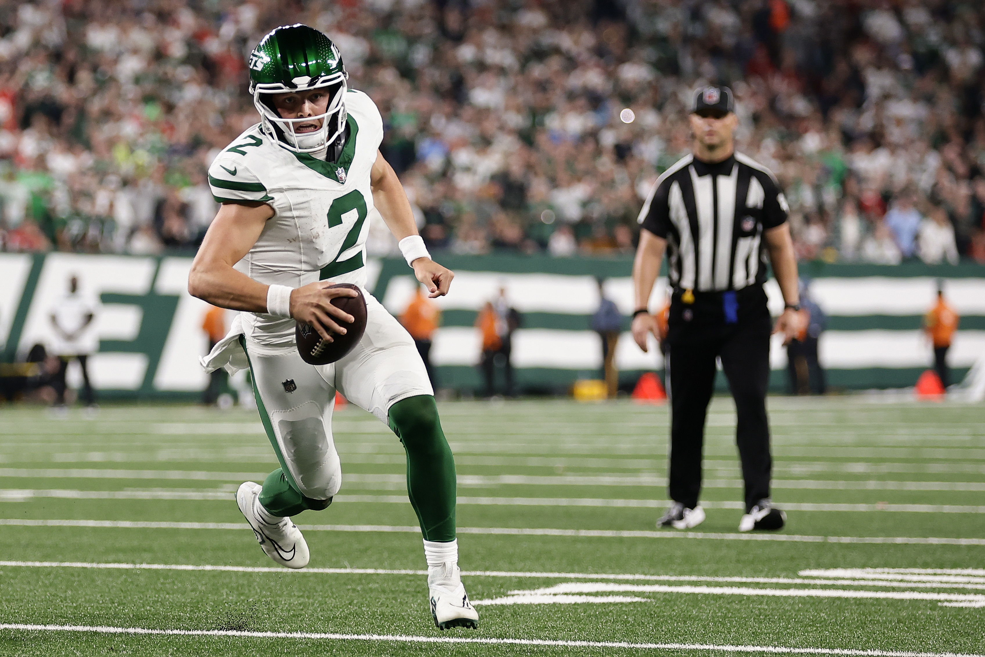 New York Jets quarterback Zach Wilson (2) runs for a two-point conversion against the Kansas City Chiefs during the third quarter of an NFL football game, Sunday, Oct. 1, 2023, in East Rutherford, N.J.