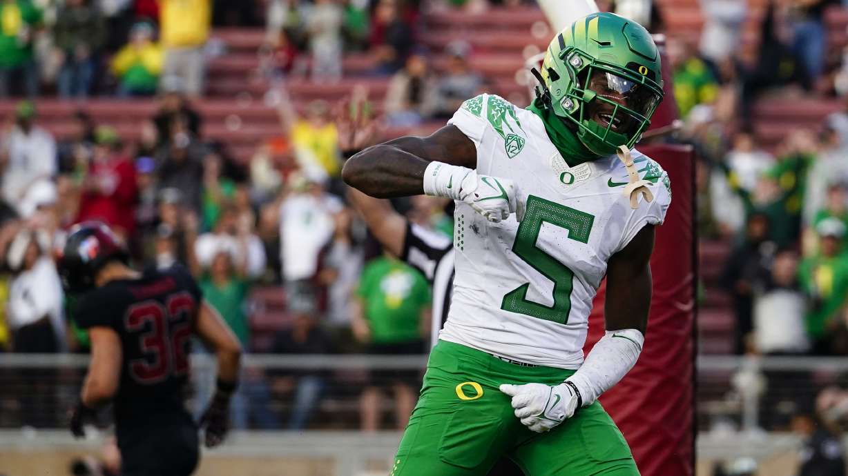 Oregon wide receiver Traeshon Holden celebrates after scoring a touchdown against Stanford during the second half of an NCAA college football game, Saturday, Sept. 30, 2023, in Stanford, Calif.