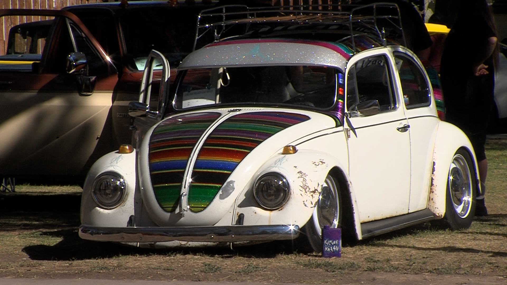 Vintage Volkswagen Beetle with a "Mexican blanket" paint job by Andy Kawahara at Kulture Krash 2021.