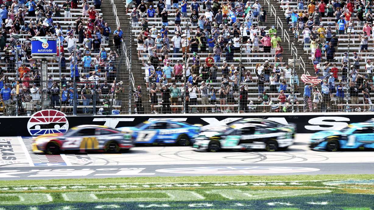 The green flag starts a NASCAR Cup Series auto race at Texas Motor Speedway in Fort Worth, Texas, Sunday, Sept. 24, 2023.