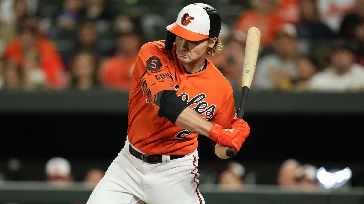 Baltimore Orioles' Gunnar Henderson swings at a pitch from the Boston Red Sox during the first inning of a baseball game, Saturday, Sept. 30, 2023, in Baltimore.