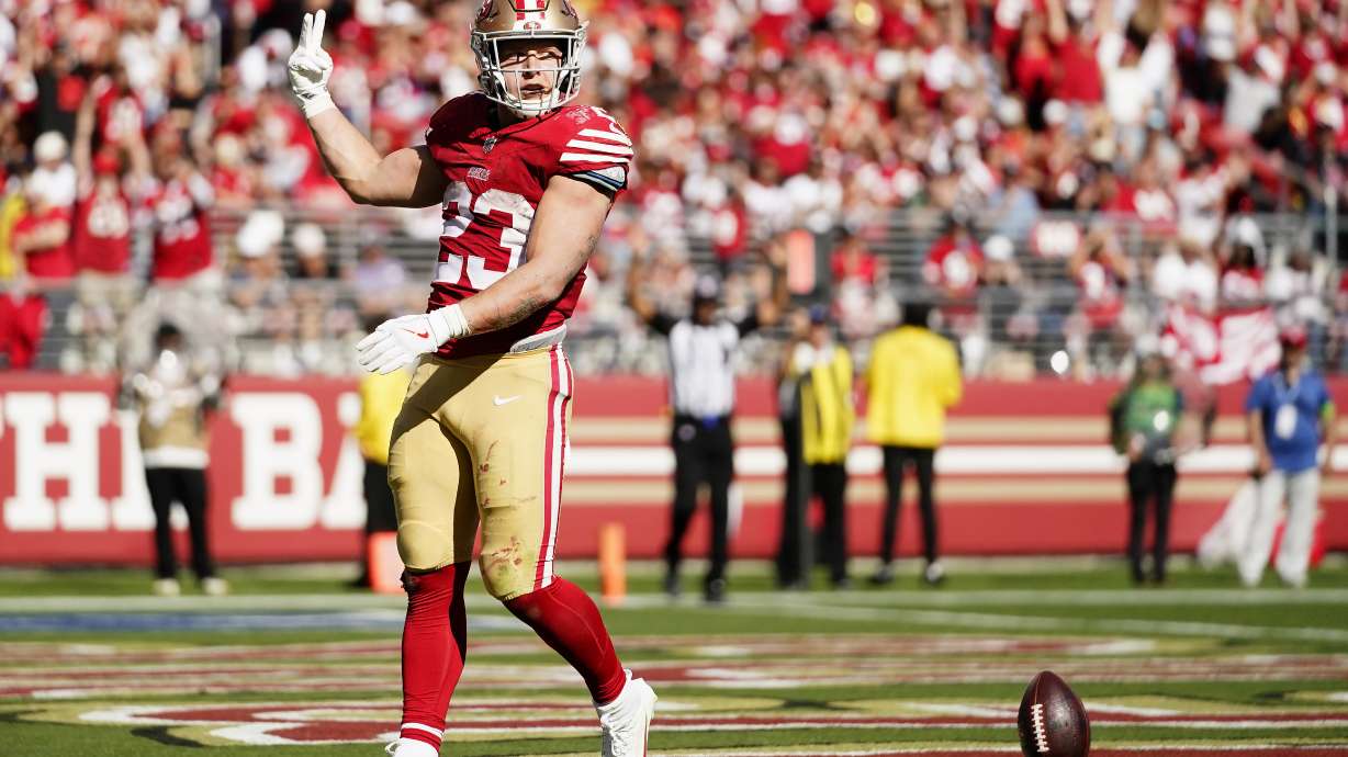 San Francisco 49ers running back Christian McCaffrey (23) celebrates after scoring against the Arizona Cardinals during the second half of an NFL football game in Santa Clara, Calif., Sunday, Oct. 1, 2023.