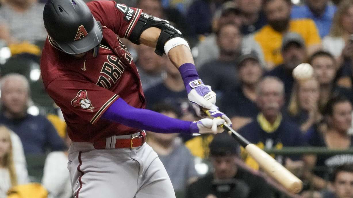 Arizona Diamondbacks' Lourdes Gurriel Jr. hits an RBI single during the sixth inning of a Game 2 of their National League wildcard baseball series against the Milwaukee Brewers Wednesday, Oct. 4, 2023, in Milwaukee.