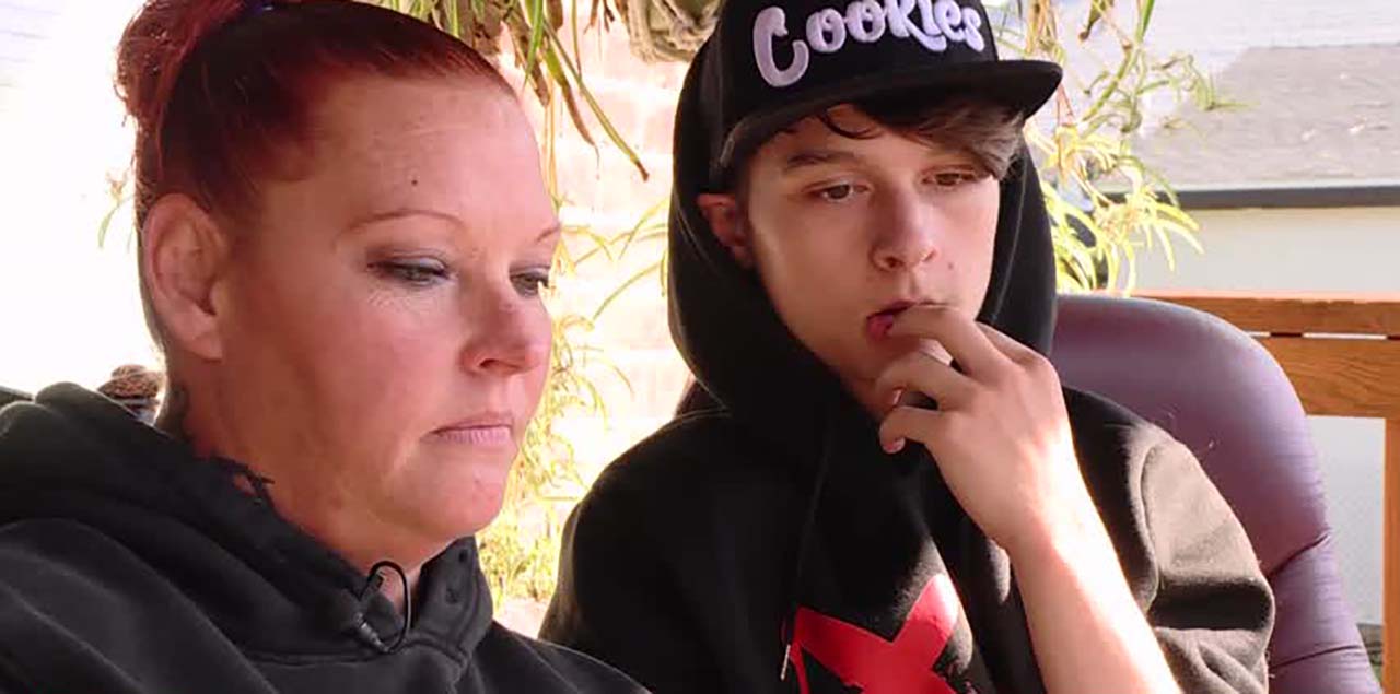 Melissa Zinsky and her son, Zack, talk to KSL Wednesday in Ogden. She says she's outraged after an incident on video in which a school resource officer pushes her son against the lockers at Ogden High School.