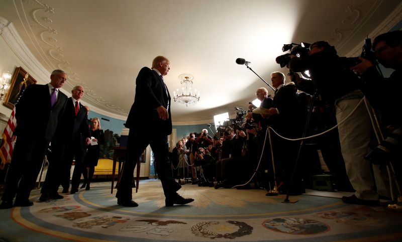 President Donald Trump departs, after speaking about Congress' $1.3 trillion spending bill, during a signing ceremony for the bill, in the Diplomatic Room of the White House in Washington on March 23, 2018. Trump may meet next week with fellow Republicans in the U.S. House of Representatives when they hear from candidates who hope to replace ousted Speaker Kevin McCarthy.