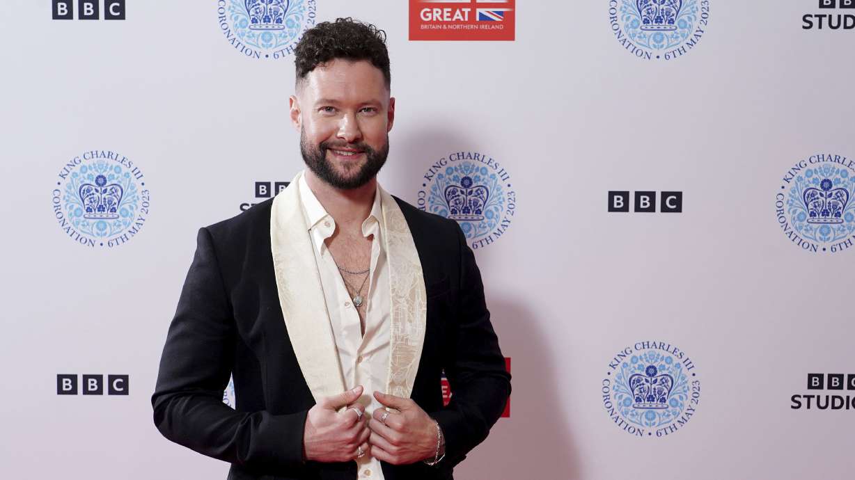 FILE - Calum Scott poses backstage at the Coronation Concert held in the grounds of Windsor Castle, Berkshire, to celebrate the coronation of King Charles III and Queen Camilla, Sunday May 7, 2023. Calum Scott never would have guessed his version of a song about a lonely, heartbroken person would become a postseason anthem for a team in America. But the English singer is ready to come to Philadelphia and sing "Dancing on My Own" should the Phillies win the World Series.