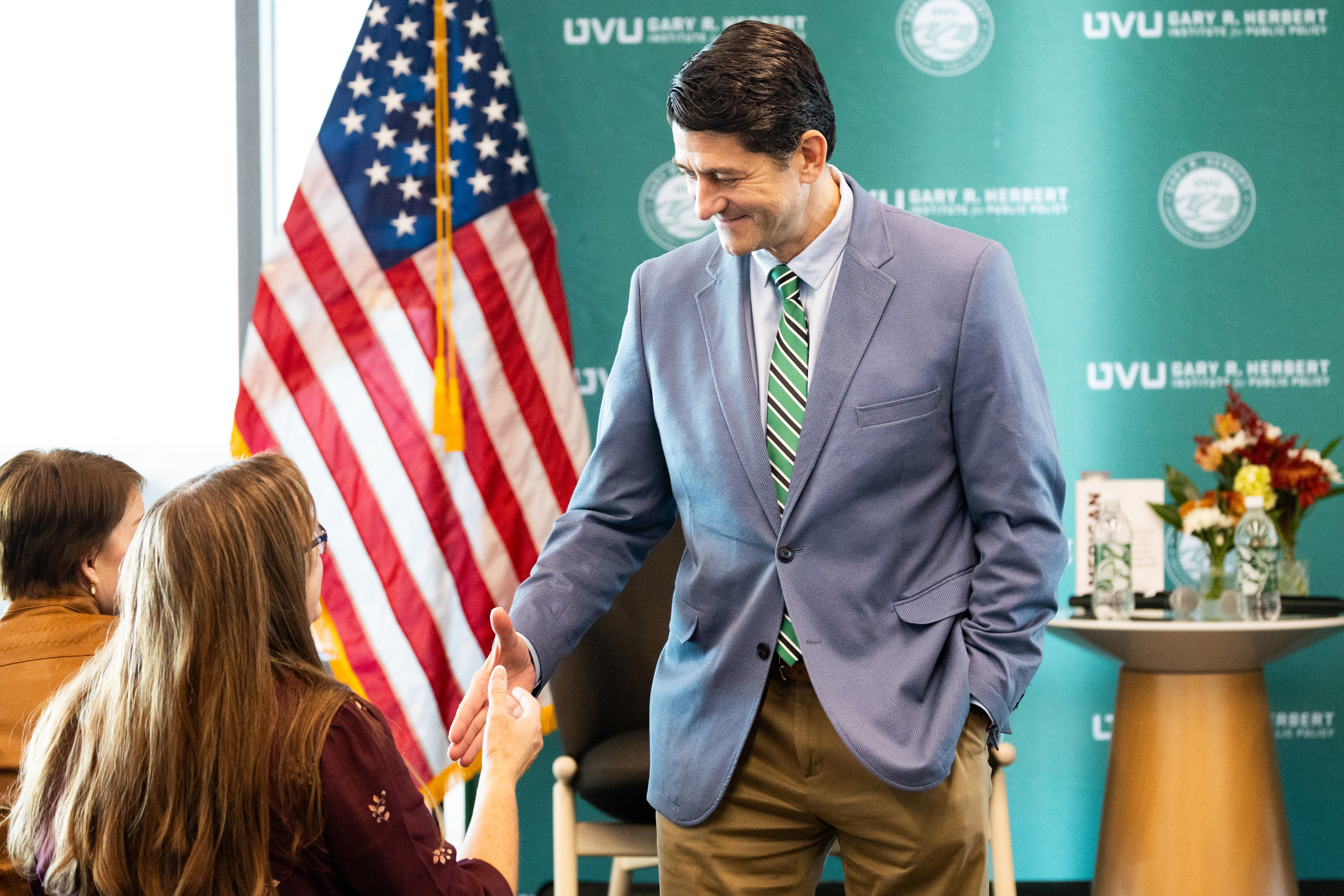 Paul Ryan, a former U.S. House speaker and the 2012 Republican vice presidential candidate, shakes hands with Maryann Jones after a fireside chat hosted by the Gary R. Herbert Institute for Public Policy at Utah Valley University in Orem on Thursday.