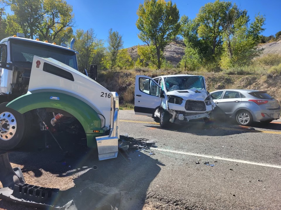 14 injured when van collides with semitruck in Kane County