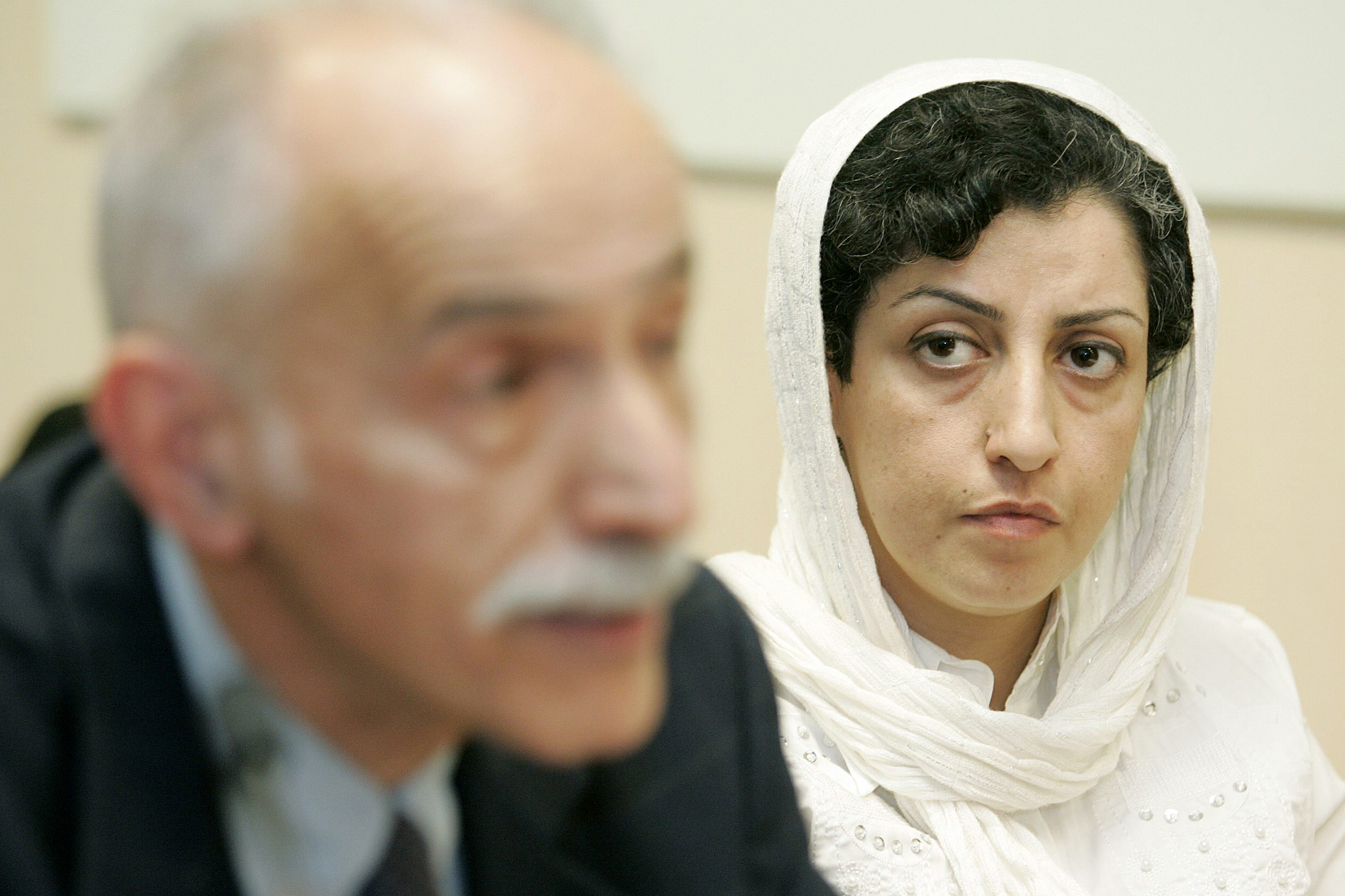 Iranian Narges Mohammadi, right, from the center for Human Rights Defenders, listens to Karim Lahidji in Geneva, Switzerland, on June 9, 2008. The 2023 Nobel Peace Prize has been awarded to Mohammadi for fighting oppression of women.