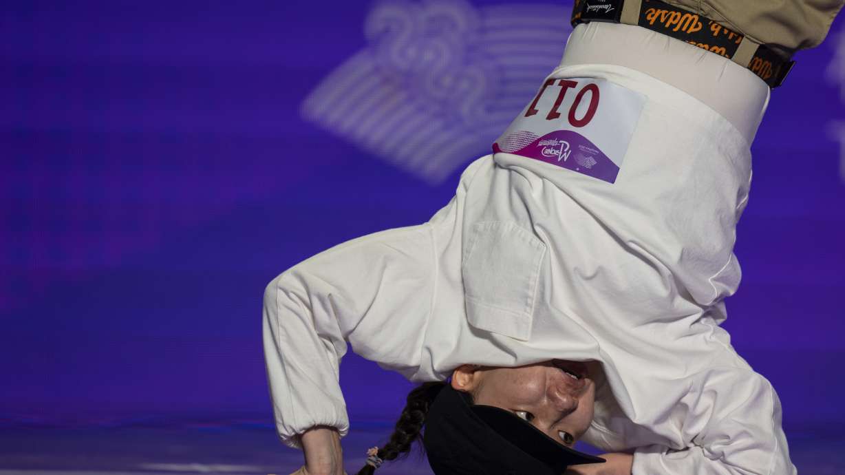 CORRECTS NAME - Mongolia's Khandjar Myagmarjav competes during the women's pre-selection for breaking at the 19th Asian Games in Hangzhou, China, Friday, Oct. 6, 2023.