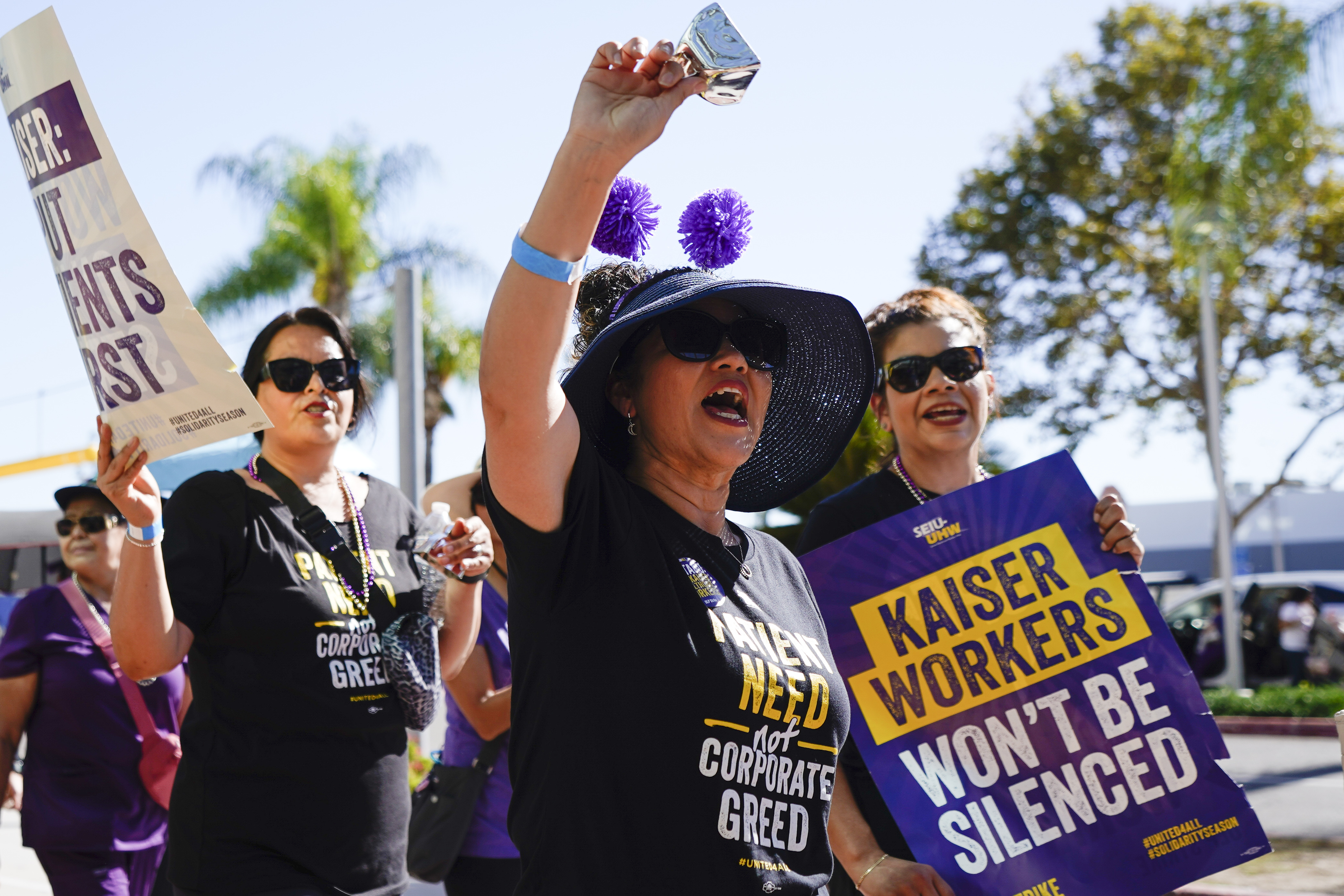 Kaiser Permanent workers picket Thursday in Baldwin Park, Calif. Some 75,000 Kaiser Permanente hospital employees who say understaffing is hurting patient care walked off the job in five states and the District of Columbia, kicking off a major health care worker strike.