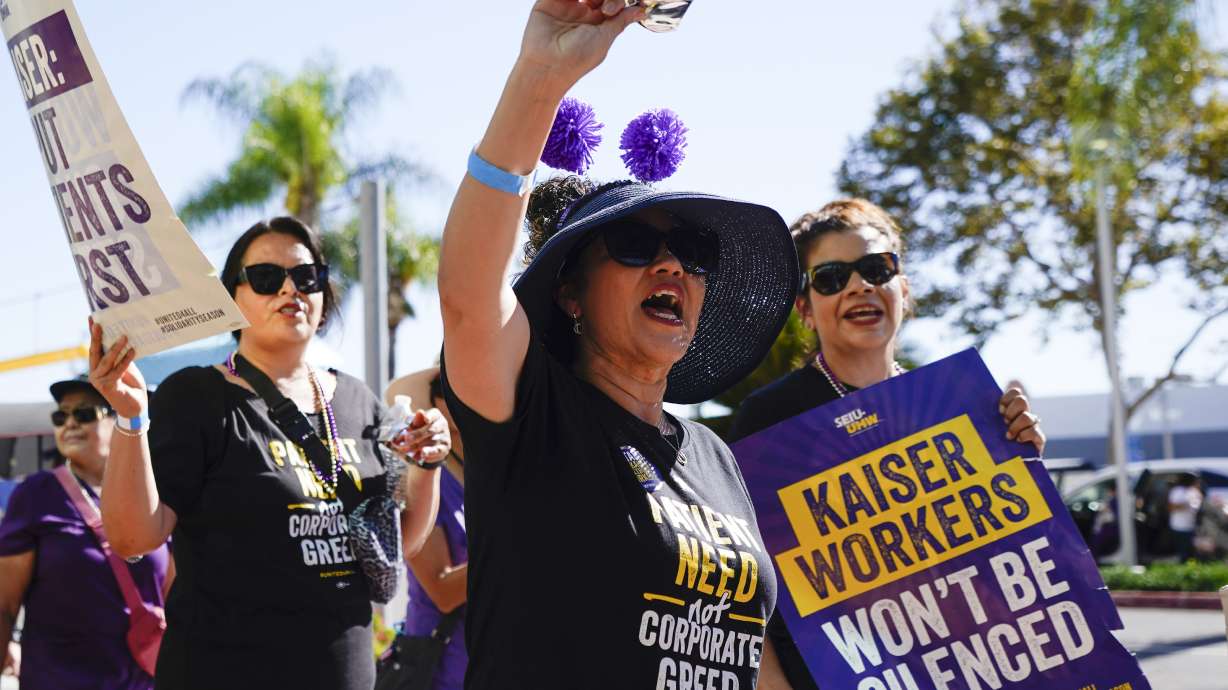 Kaiser Permanent workers picket Thursday in Baldwin Park, Calif. Some 75,000 Kaiser Permanente hospital employees who say understaffing is hurting patient care walked off the job in five states and the District of Columbia, kicking off a major health care worker strike.