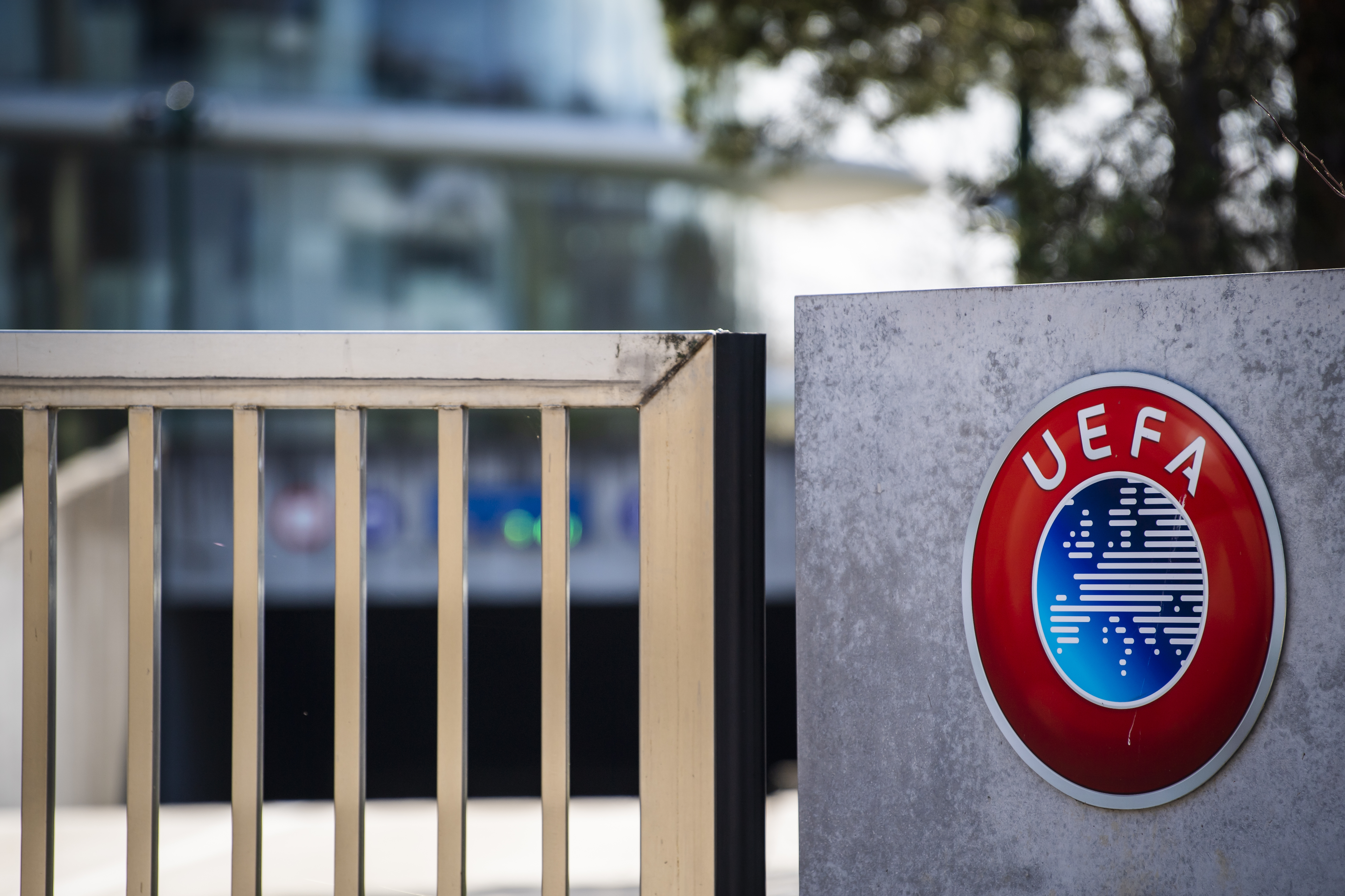 FILE - The UEFA logo displayed to the entrance of the UEFA Headquarters, in Nyon, Switzerland, Tuesday, March 17, 2020. UEFA’s decision to welcome Russian youth teams back into its competitions has cost its Swedish vice president his other top-tier job as head of a national sports body. Karl-Erik Nilsson has on Friday, Oct. 6, 2024 resigned as chairman of the Swedish Sports Confederation.