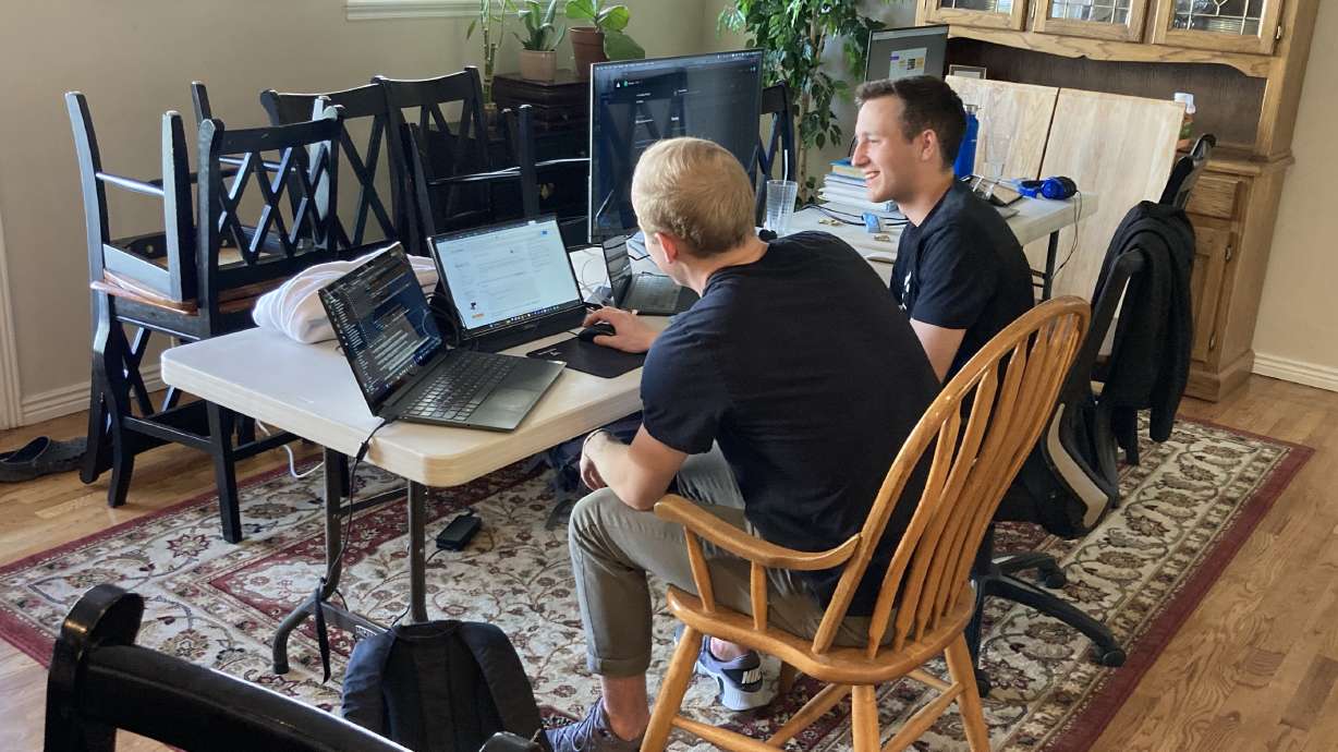 Aaron Jarrett, left, and Brendan Dewberry work together on Learned Local, a website for creators to teach what they love.