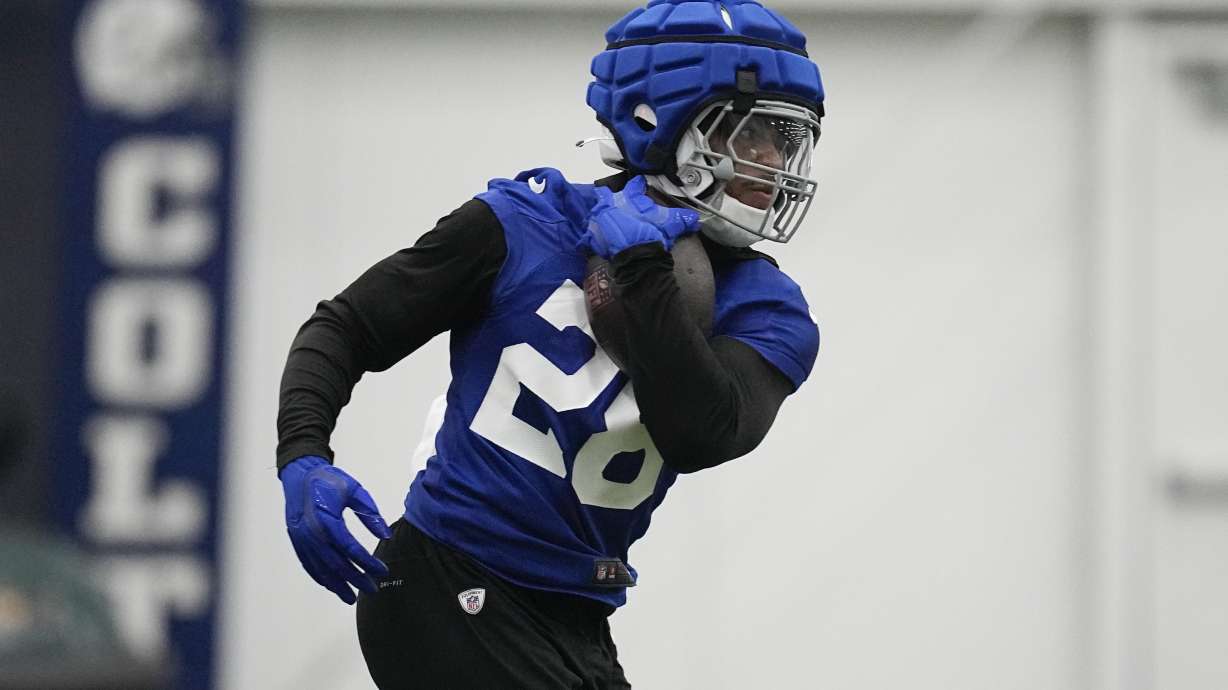 Indianapolis Colts' Jonathan Taylor runs a drill during an NFL football practice, Thursday, Oct. 5, 2023, in Indianapolis.