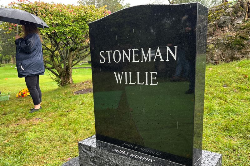 The gravestone of James Murphy, a man accidentally mummified and known publicly by the name "Stoneman Willie," is seen after he was publicly identified and buried after being on display at a local funeral home that has been his resting place for 128 years, in Reading, Pennsylvania, Saturday. 