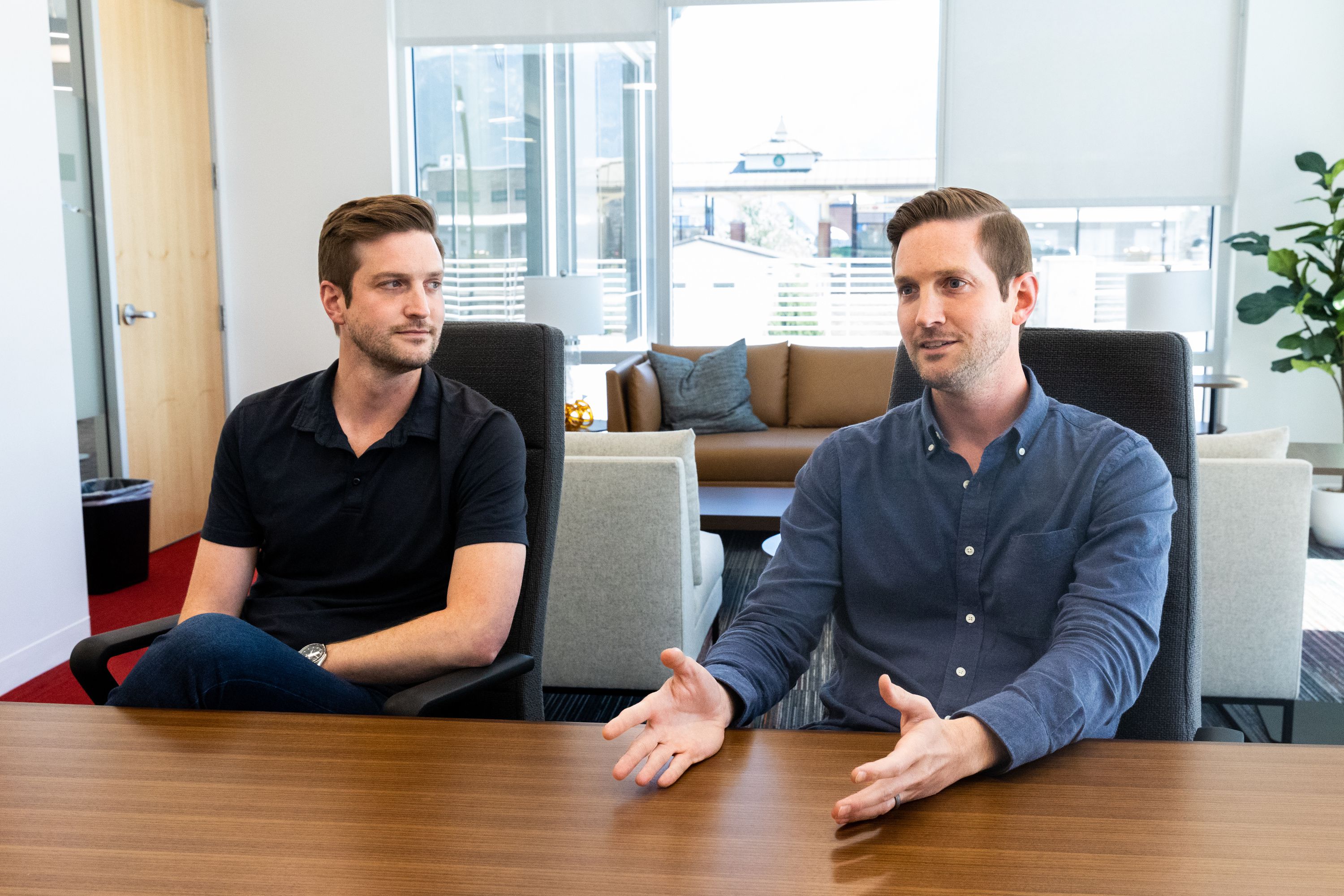 Greg, left, and Eric Levesque, founders of Utah-based tech startup Strider Technologies, discuss their company in their office in South Jordan on Monday, Aug. 14, 2023.