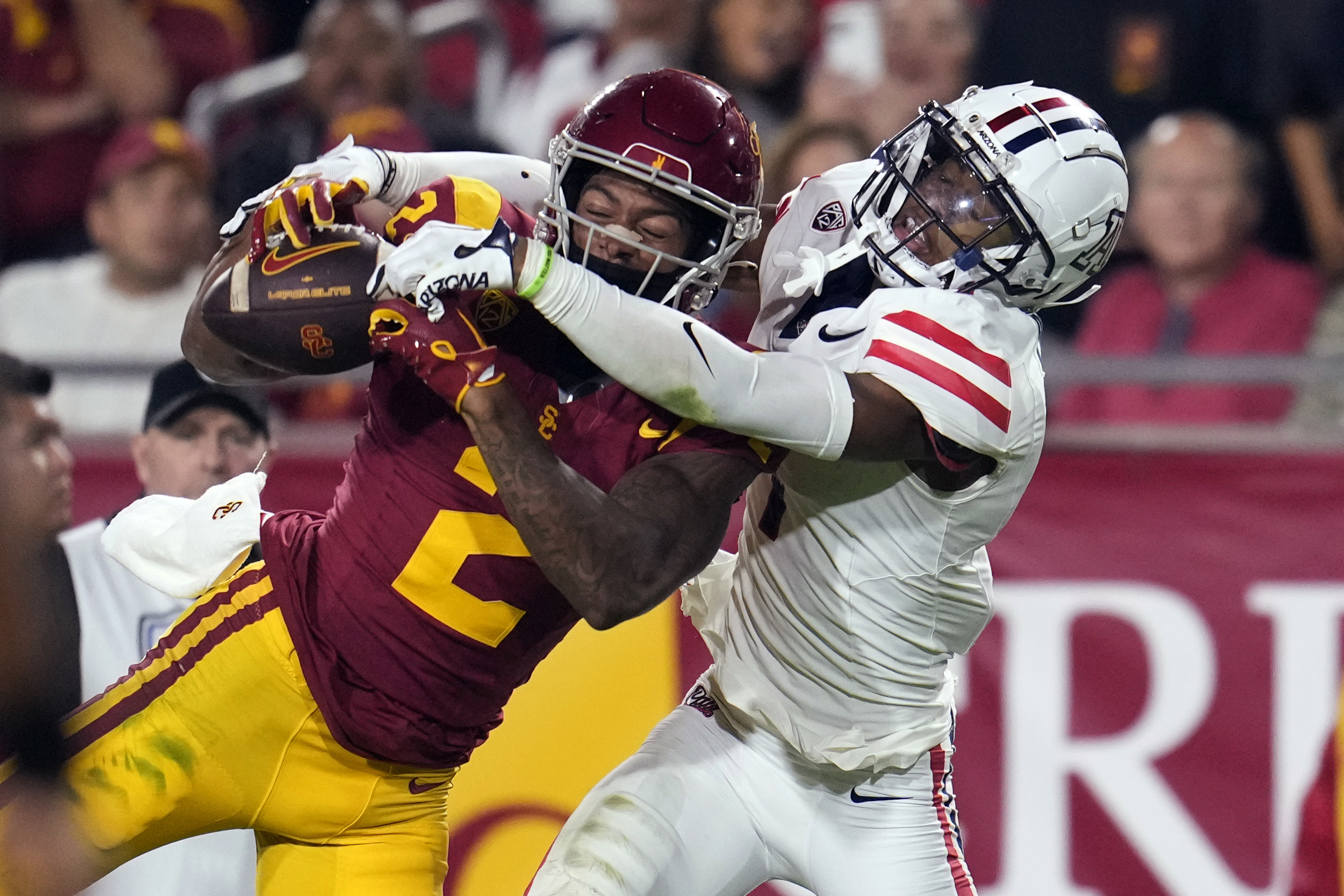Southern California wide receiver Brenden Rice (2) makes a catch as Arizona cornerback Ephesians Prysock defends during the first half of an NCAA college football game Saturday, Oct. 7, 2023, in Los Angeles.