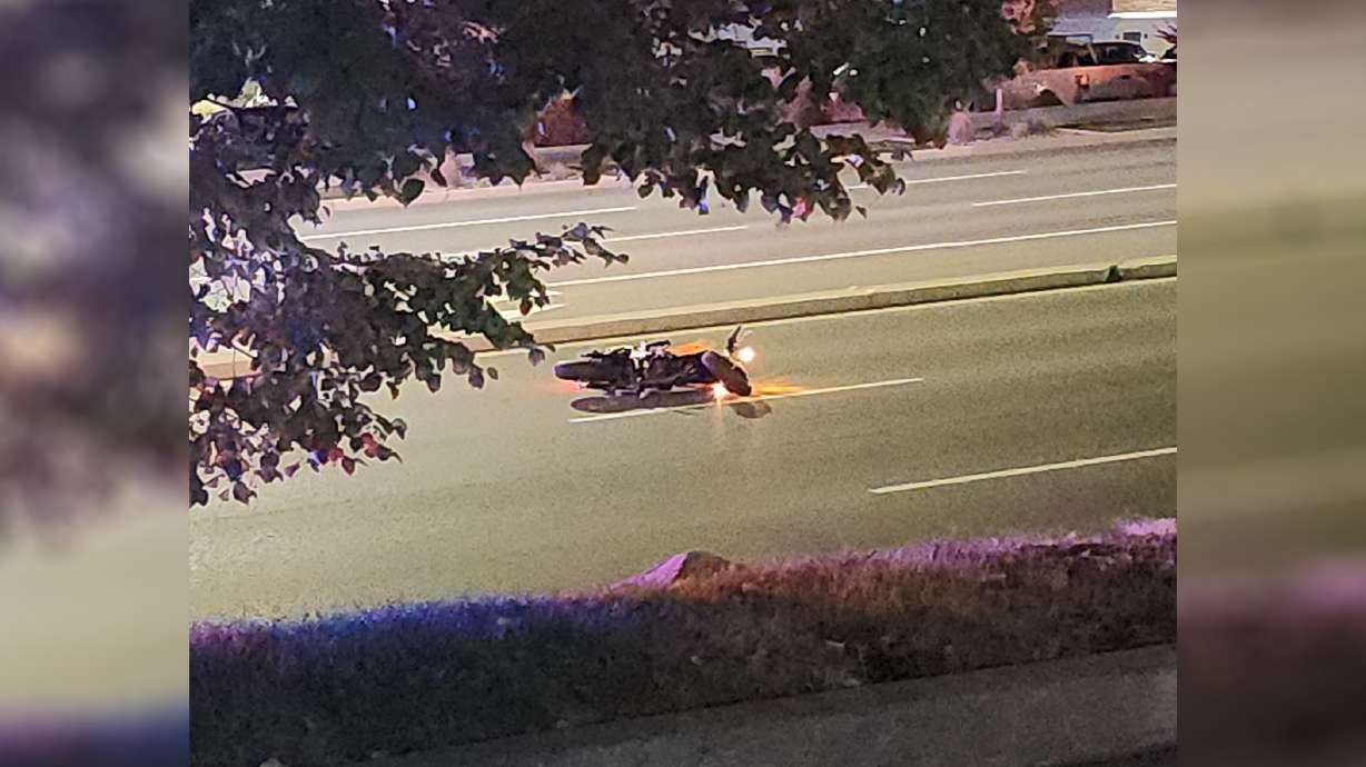 A motorcyclist died in a collision with an SUV in Sandy early Sunday morning and the driver of the SUV fled the scene, the Sandy Police Department said.