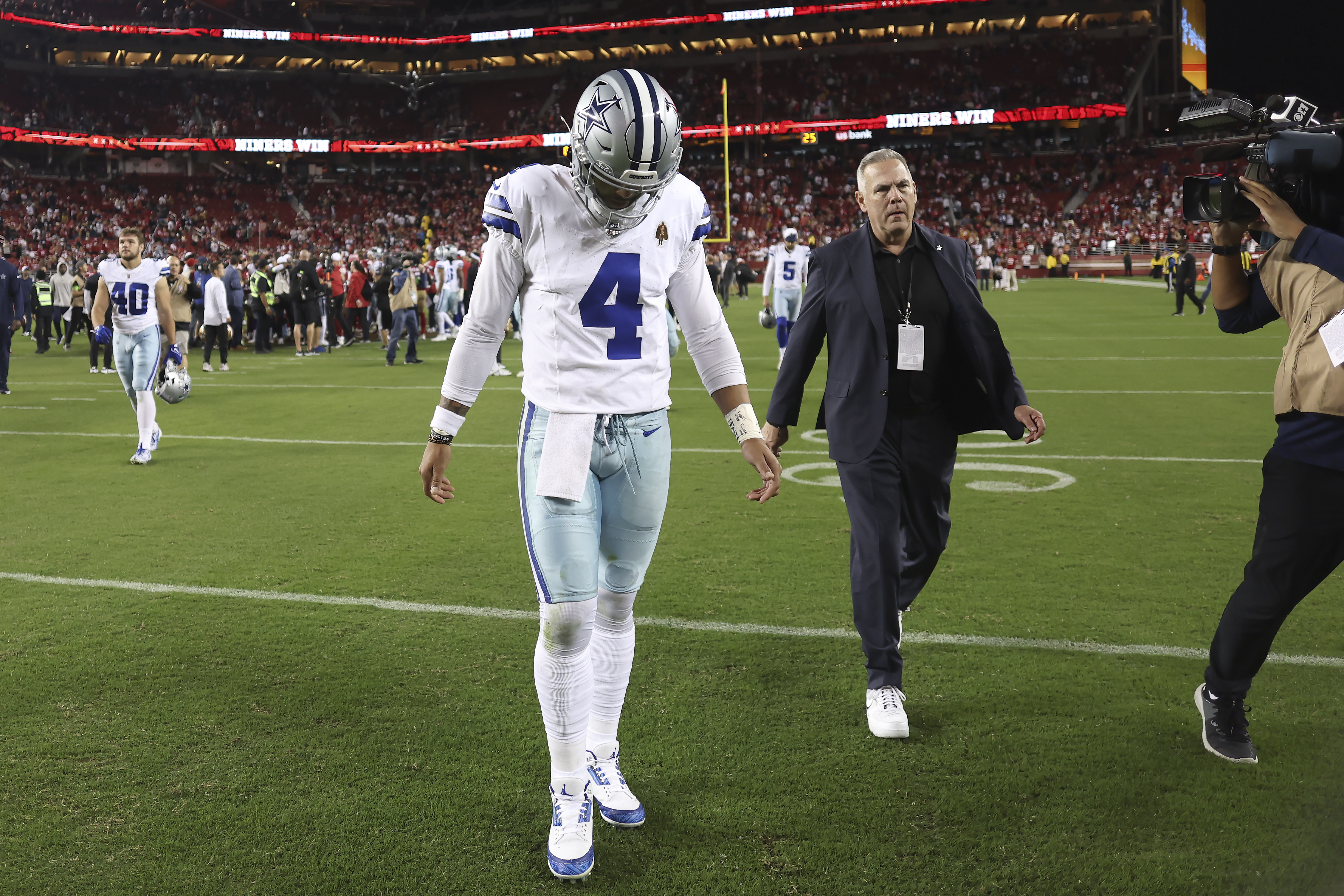 Dallas Cowboys quarterback Dak Prescott (4) walks off the field after an NFL football game against the San Francisco 49ers in Santa Clara, Calif., Sunday, Oct. 8, 2023.