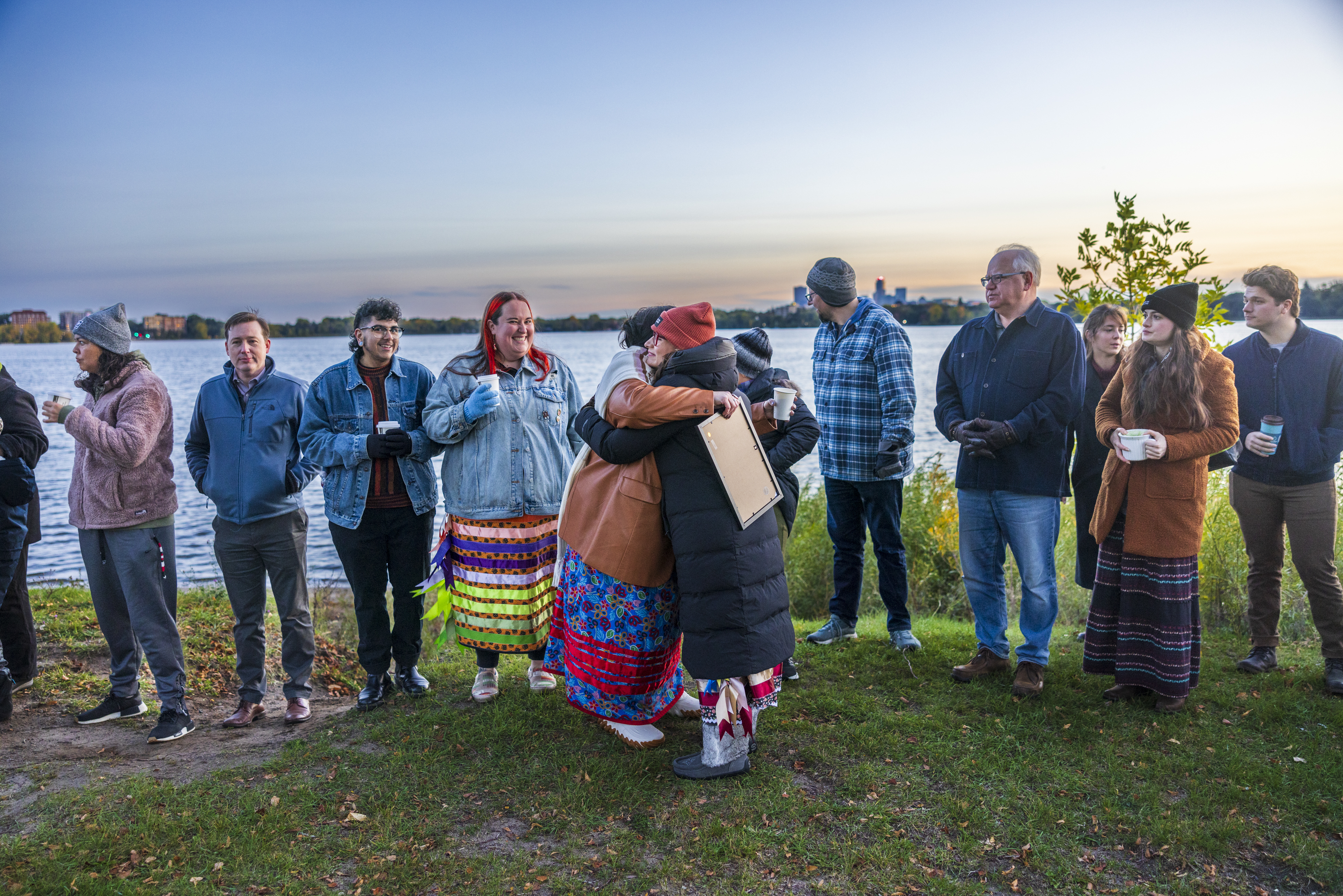 People attend an Indigenous Peoples Day Sunrise Ceremony at Bde Maka Ska in Minneapolis, Minn. on Monday.