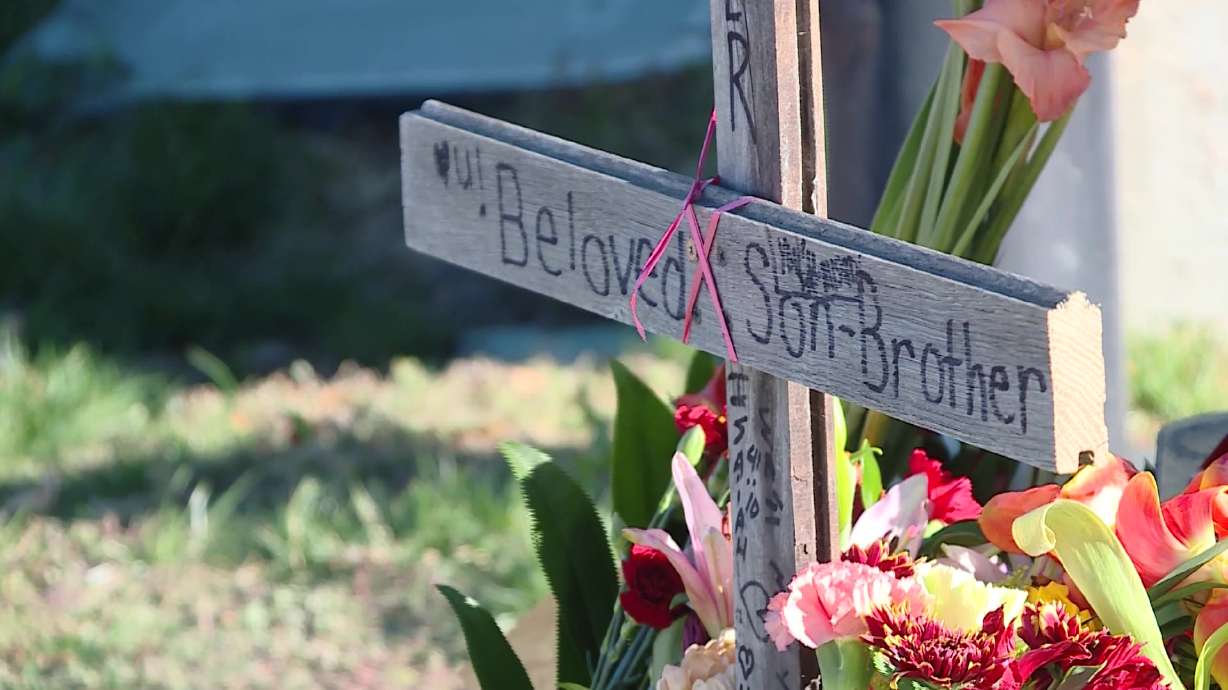 A memorial at the scene of the accident where 22-year-old Ryker Reynolds was killed in October 2023. A Sandy man has been sentenced to prison for causing the crash while driving under the influence.