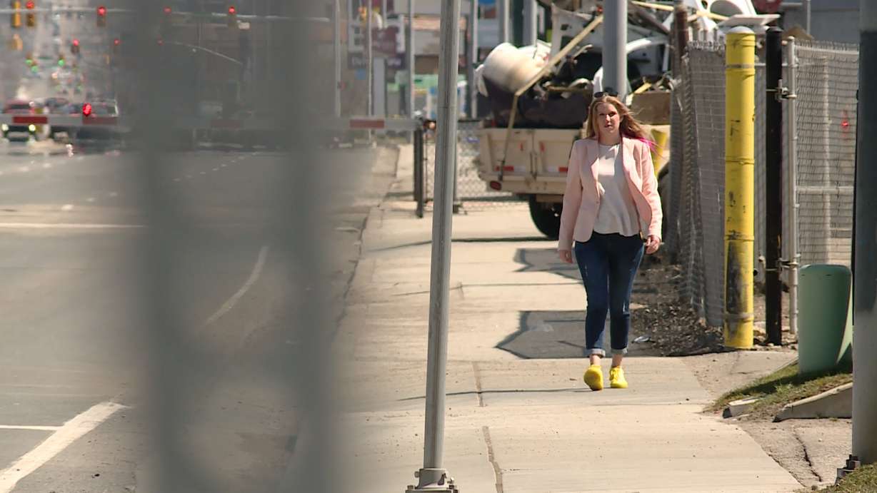 Megan walks along a busy sidewalk in Salt Lake City in this undated photo.