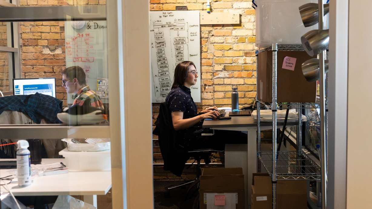 People work at Work Hive in Salt Lake City on Tuesday. Utahns self-report that they’re killing it when it comes to working from home, but aren’t so sure about their co-workers.