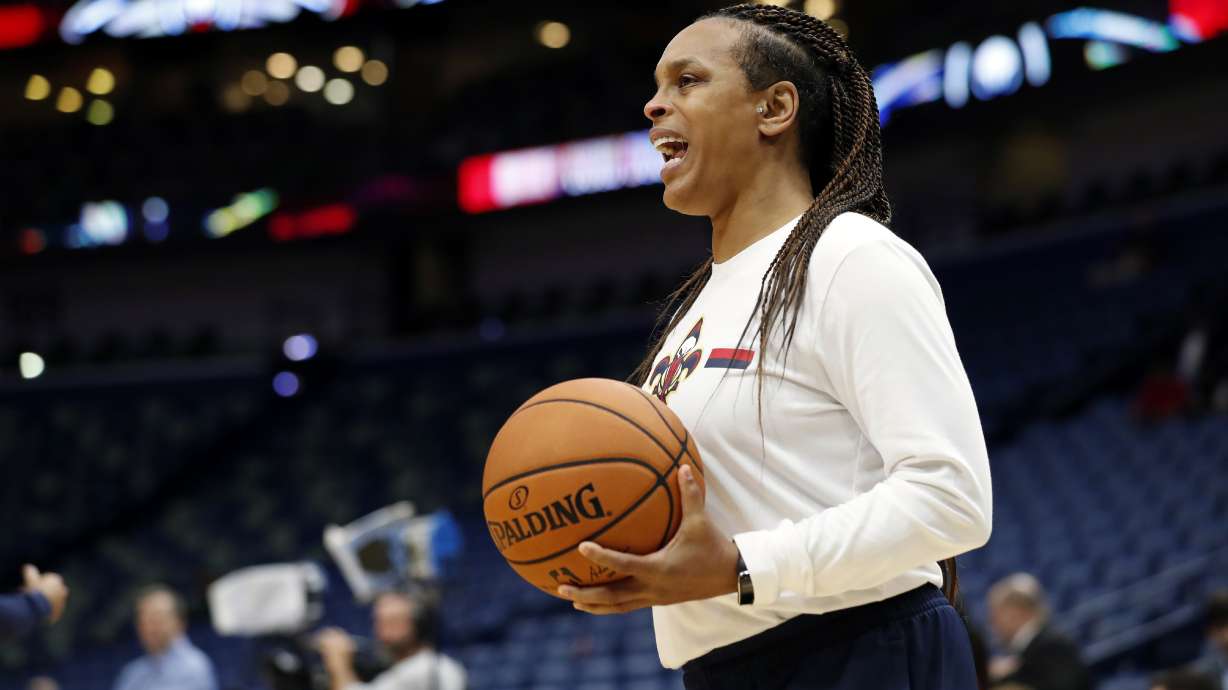 FILE - New Orleans Pelicans player development coach Teresa Weatherspoon stands on the court before the team's preseason NBA basketball game against the Utah Jazz in New Orleans, Oct. 11, 2019. The Chicago Sky have an agreement in place with Weatherspoon to make her their next coach, according to her agent Richard Gray. He confirmed the news in a text message with The Associated Press on Tuesday night, Oct. 10, 2023.