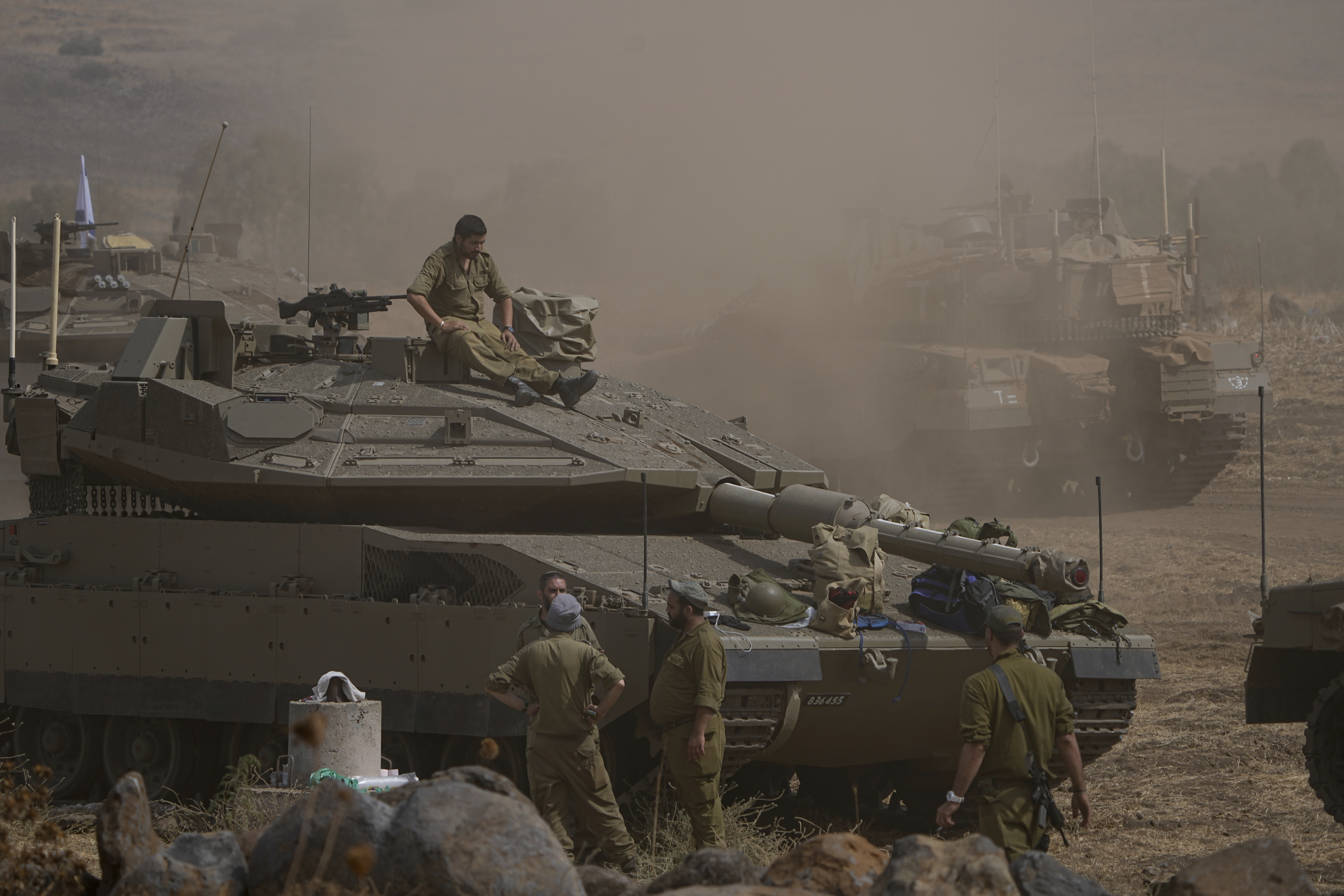 Israeli tanks are stationed near the border with Lebanon Wednesday.