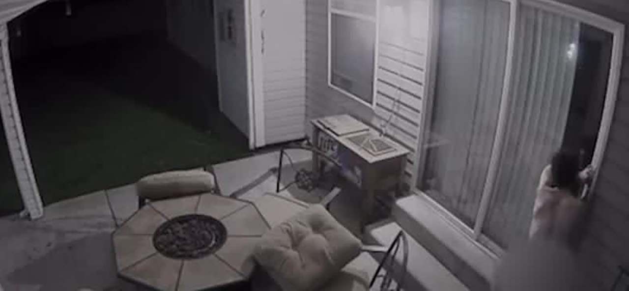 Surveillance video shows a naked man trying to get into homes in Draper Tuesday.