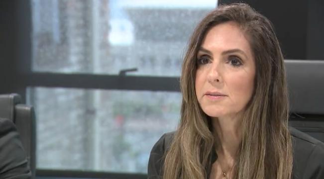 Attorney Suzette Rasmussen speaks with reporters at the offices of Mortensen Milne Law in Salt Lake City on Wednesday.