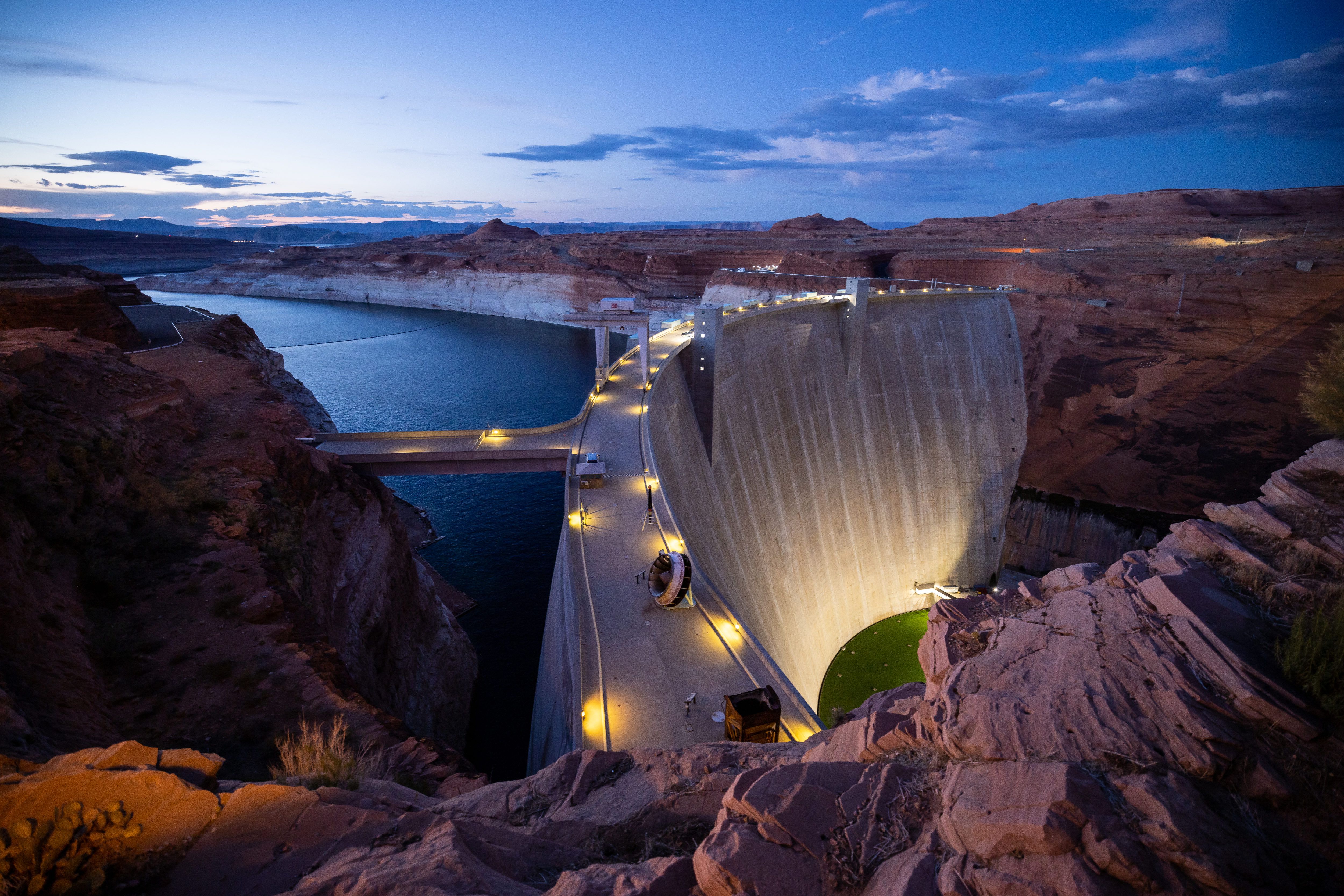 Glen Canyon Dam holds back Lake Powell in Page, Ariz., on July 18, 2022. Upper Basin was at a staggering 4 million-acre feet loss, with power generation compromised, but a wet winter helped.
